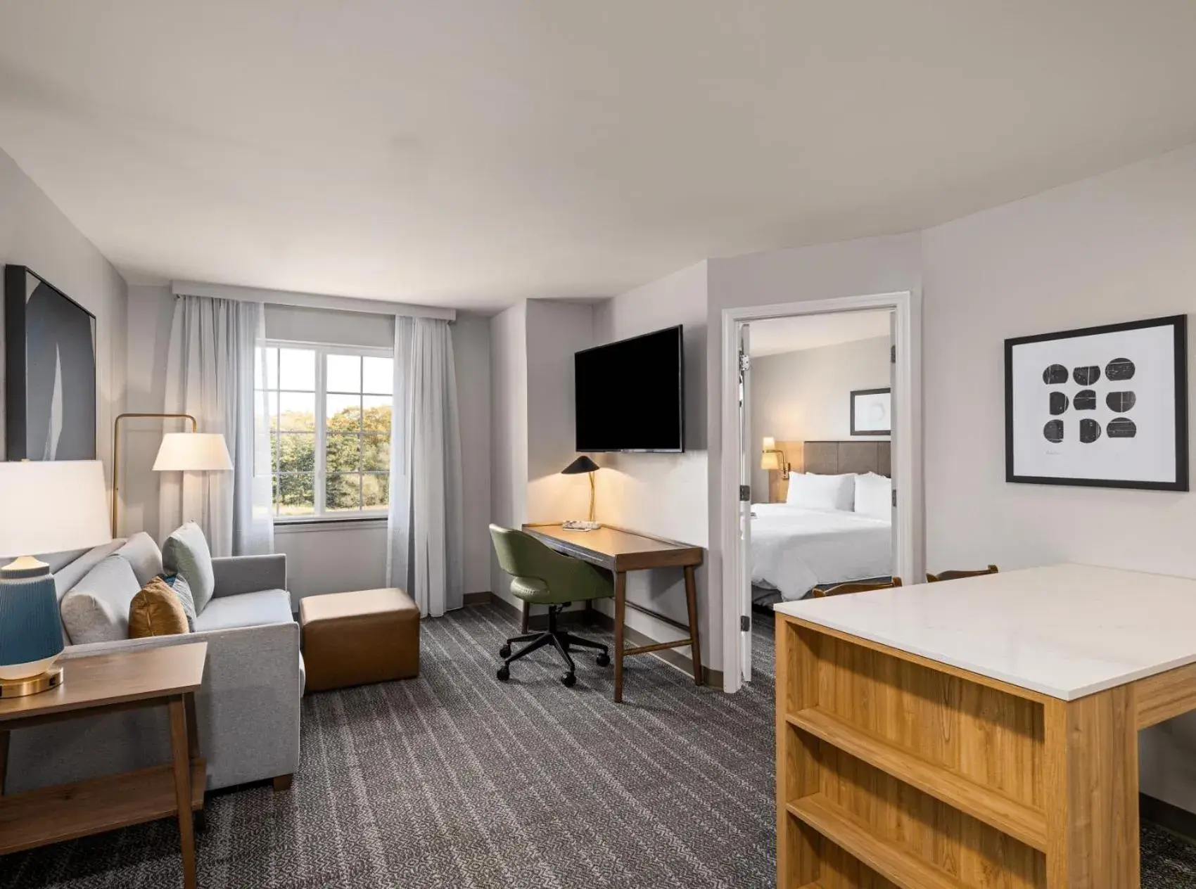 Living room, Bed in Staybridge Suites Rochester University by IHG Living room, Bed in Staybridge Suites Rochester University by IHG