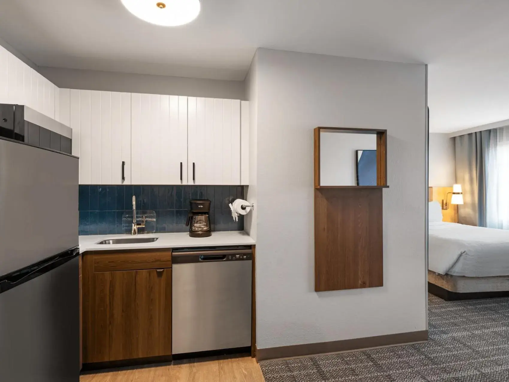 Kitchen or kitchenette, Bed in Staybridge Suites Rochester University by IHG Kitchen or kitchenette, Bed in Staybridge Suites Rochester University by IHG