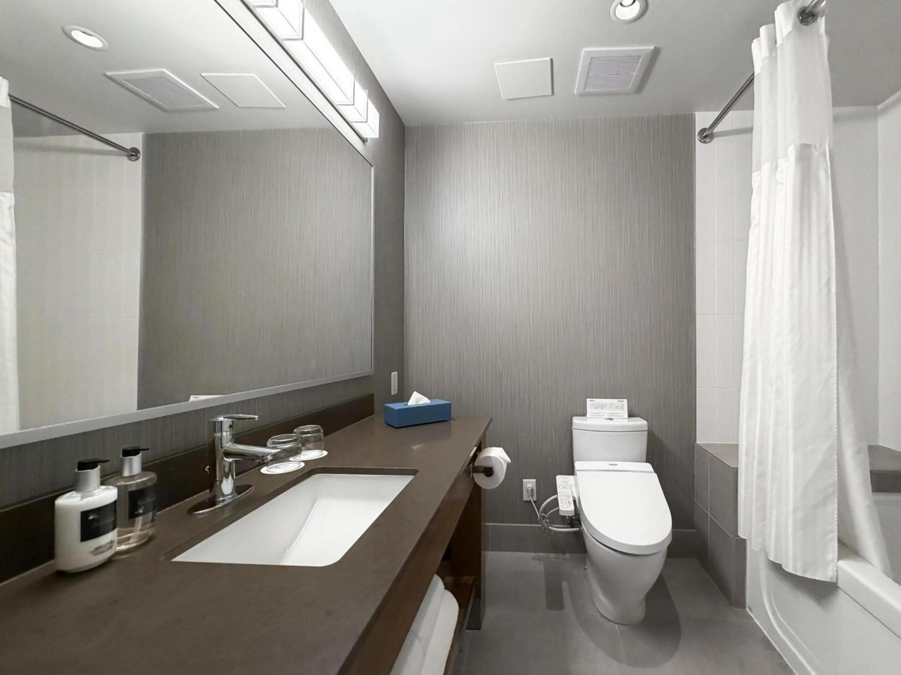 Bathroom in Coast Coal Harbour Vancouver Hotel by APA