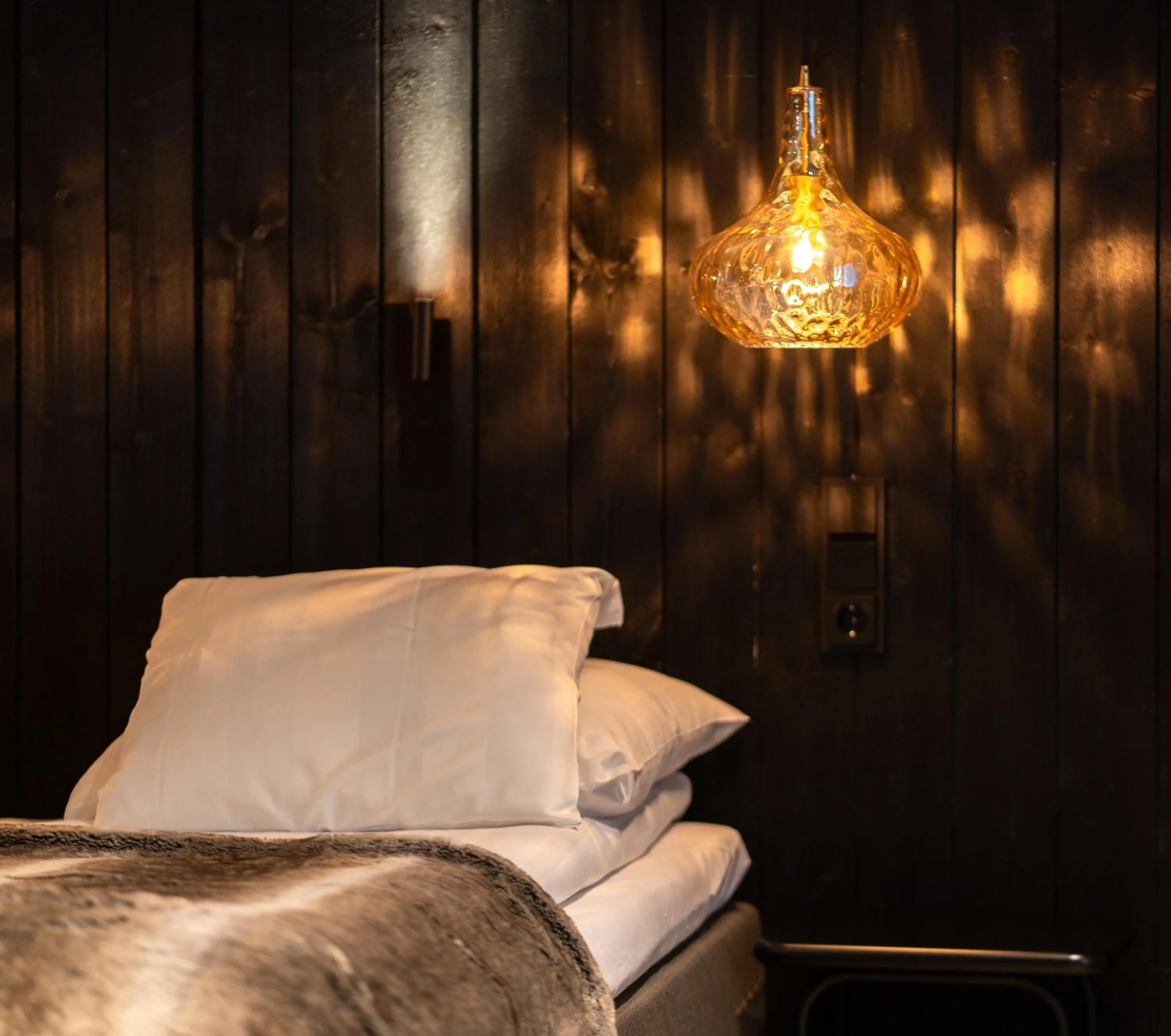 Decorative detail, Bed in Wilderness Hotel Juutua