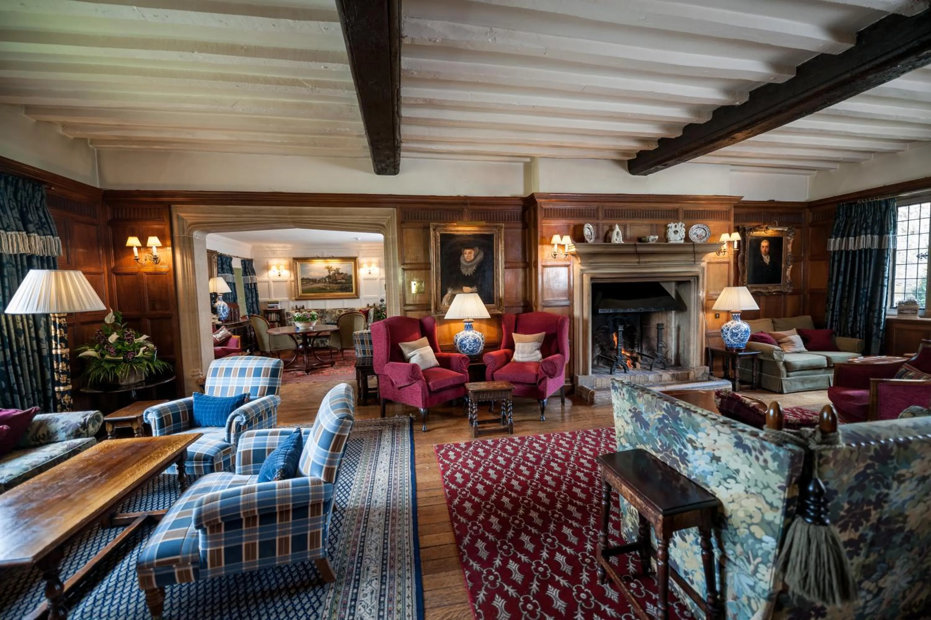 Communal lounge/ TV room in Buckland Manor - A Relais & Chateaux Hotel