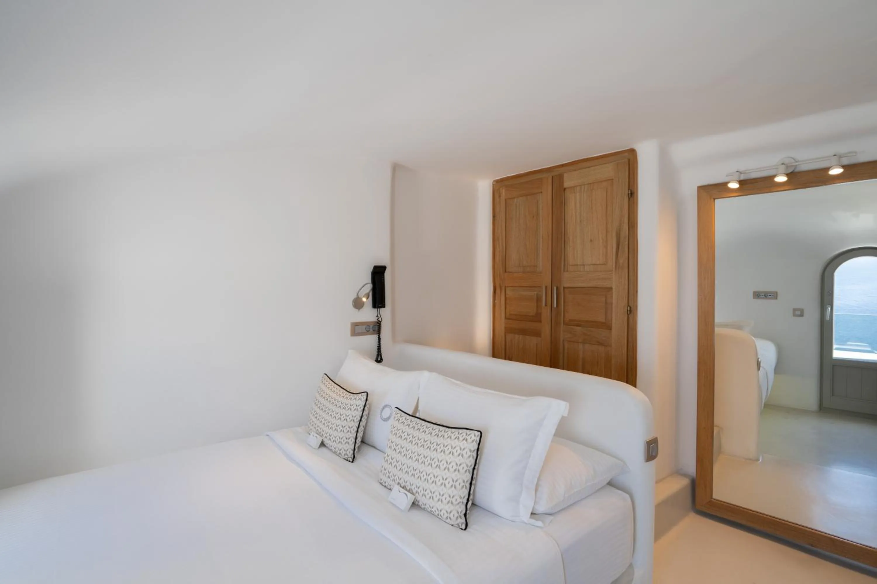 Bed in La Perla Villas and Suites - Adults Only