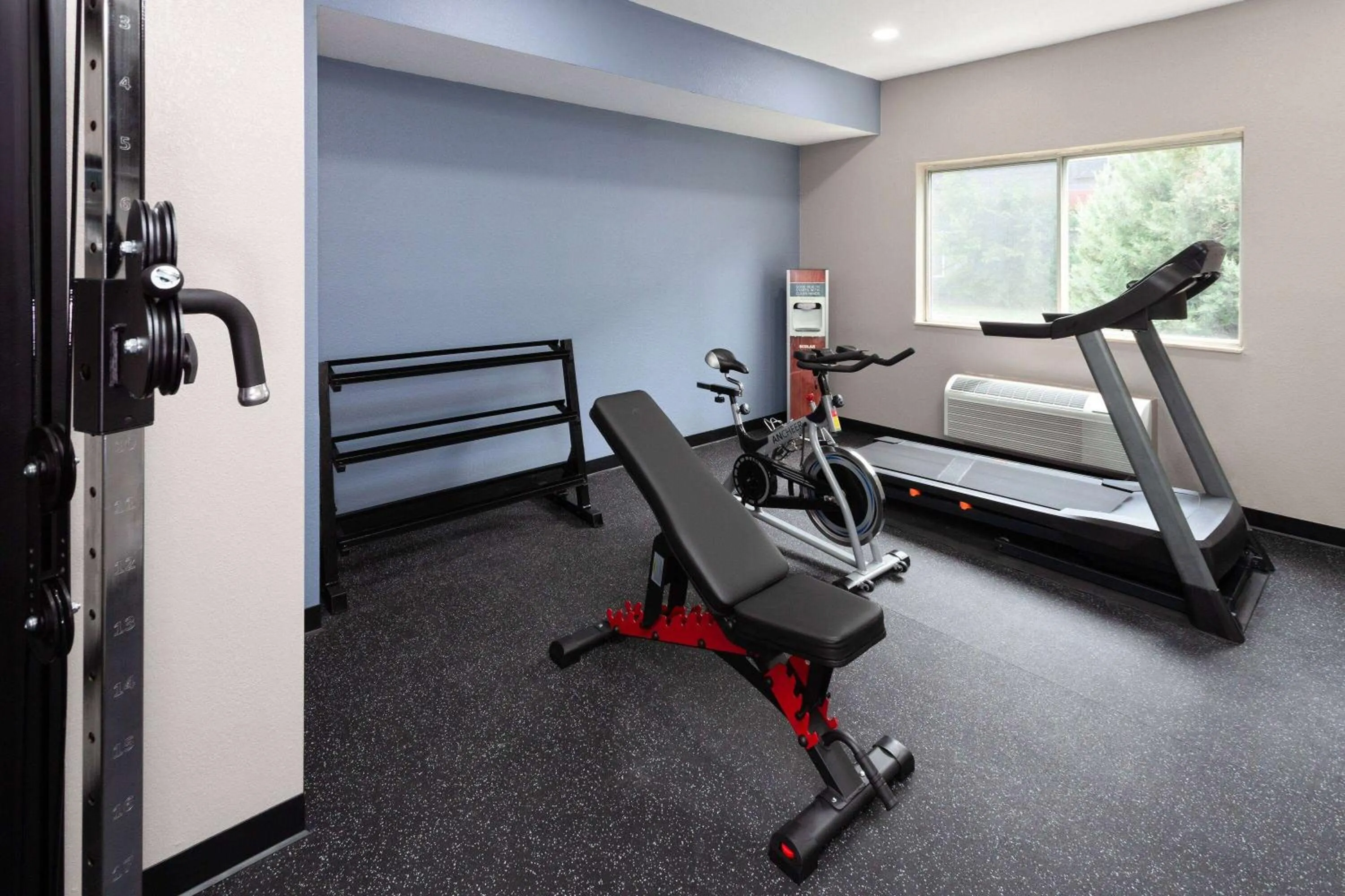Fitness centre/facilities in AmericInn by Wyndham Hudson
