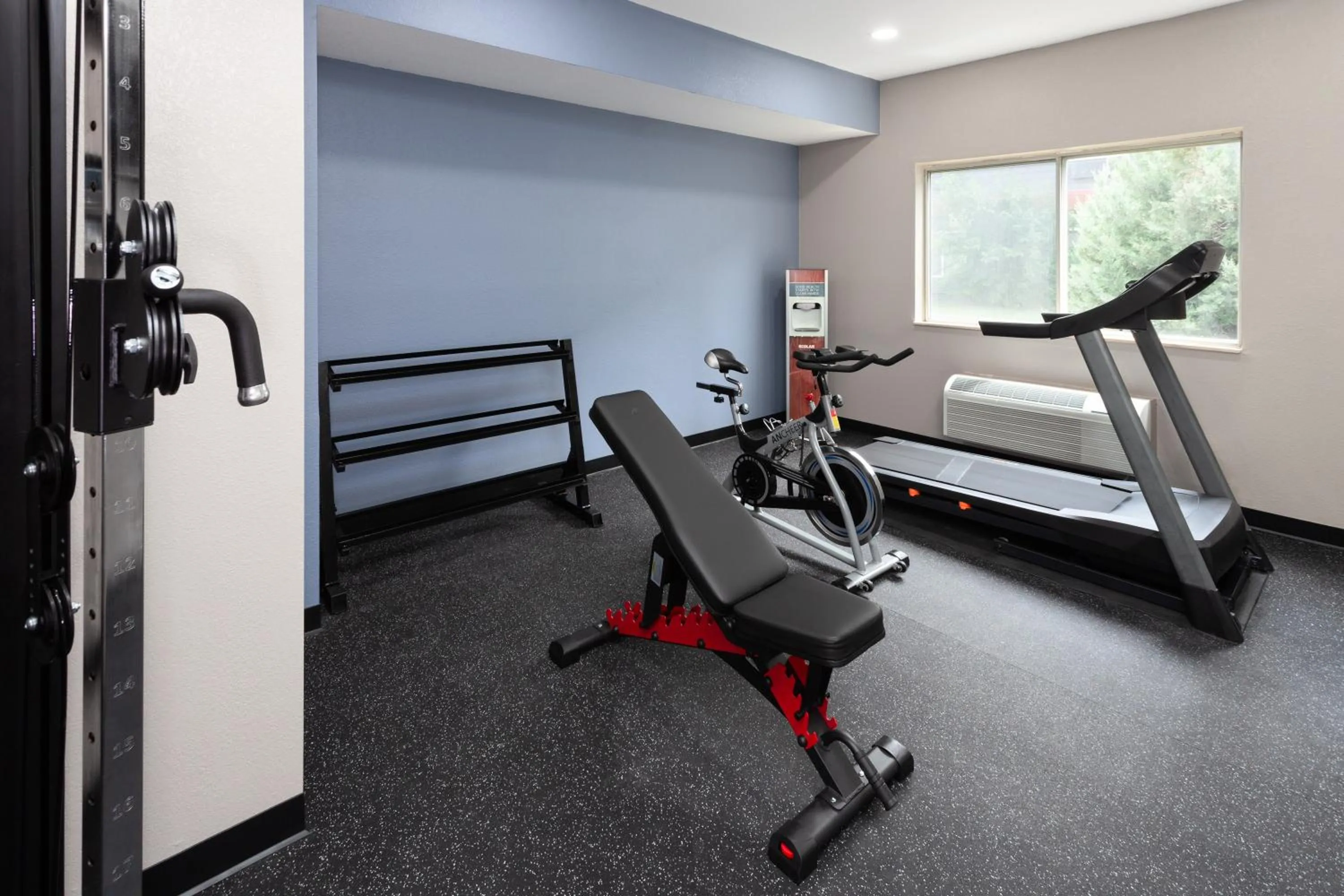 Fitness centre/facilities in AmericInn by Wyndham Hudson