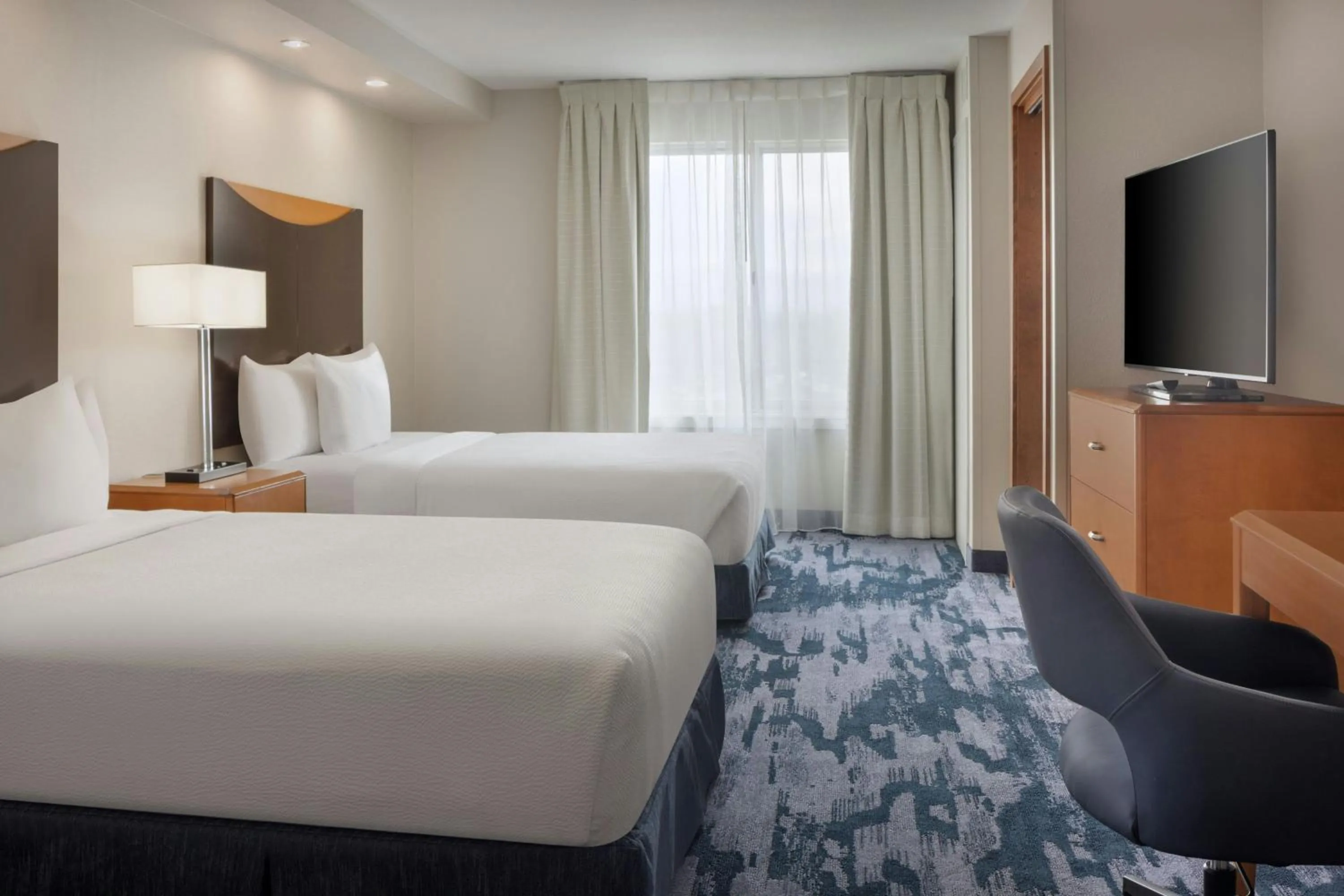 Photo of the whole room, Bed in Fairfield Inn and Suites Turlock