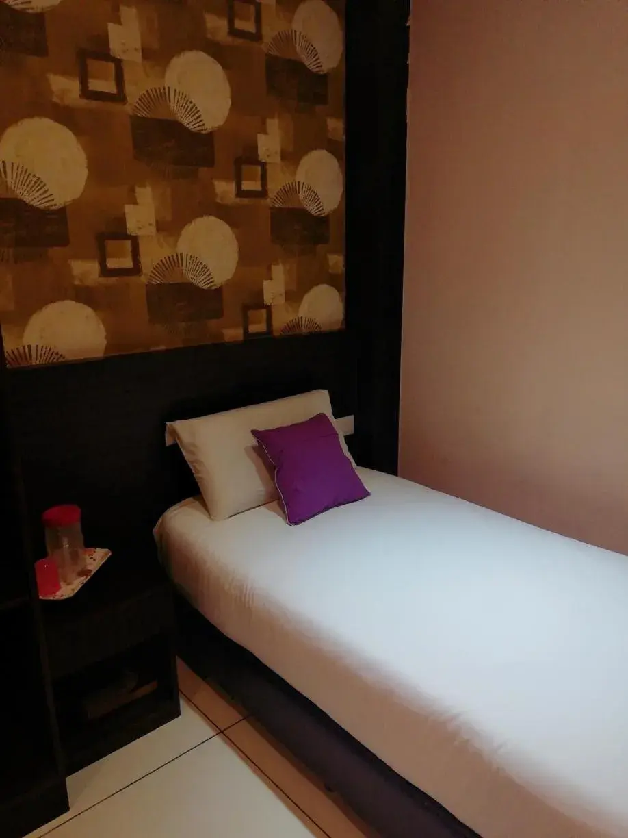 Bed in Remember Hotel Bukit Gambir Bed in Remember Hotel Bukit Gambir