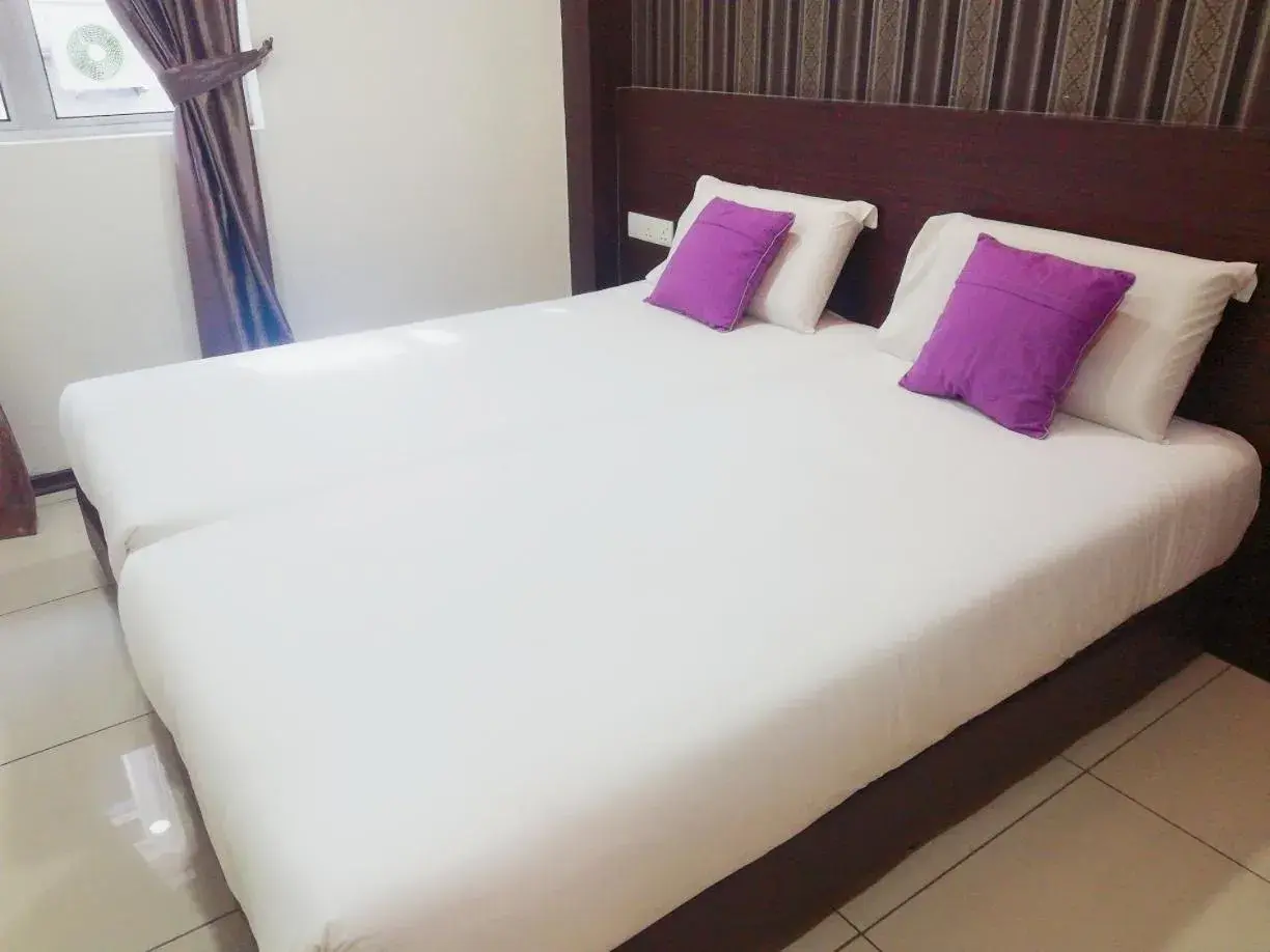 Bed in Remember Hotel Bukit Gambir Bed in Remember Hotel Bukit Gambir