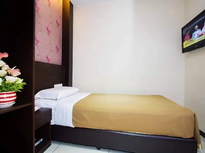 Bed in Remember Hotel Bukit Gambir