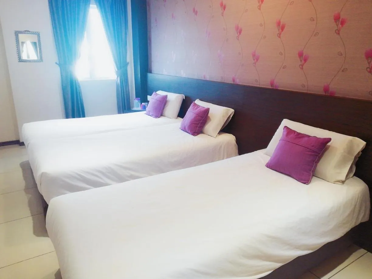 Bed in Remember Hotel Bukit Gambir