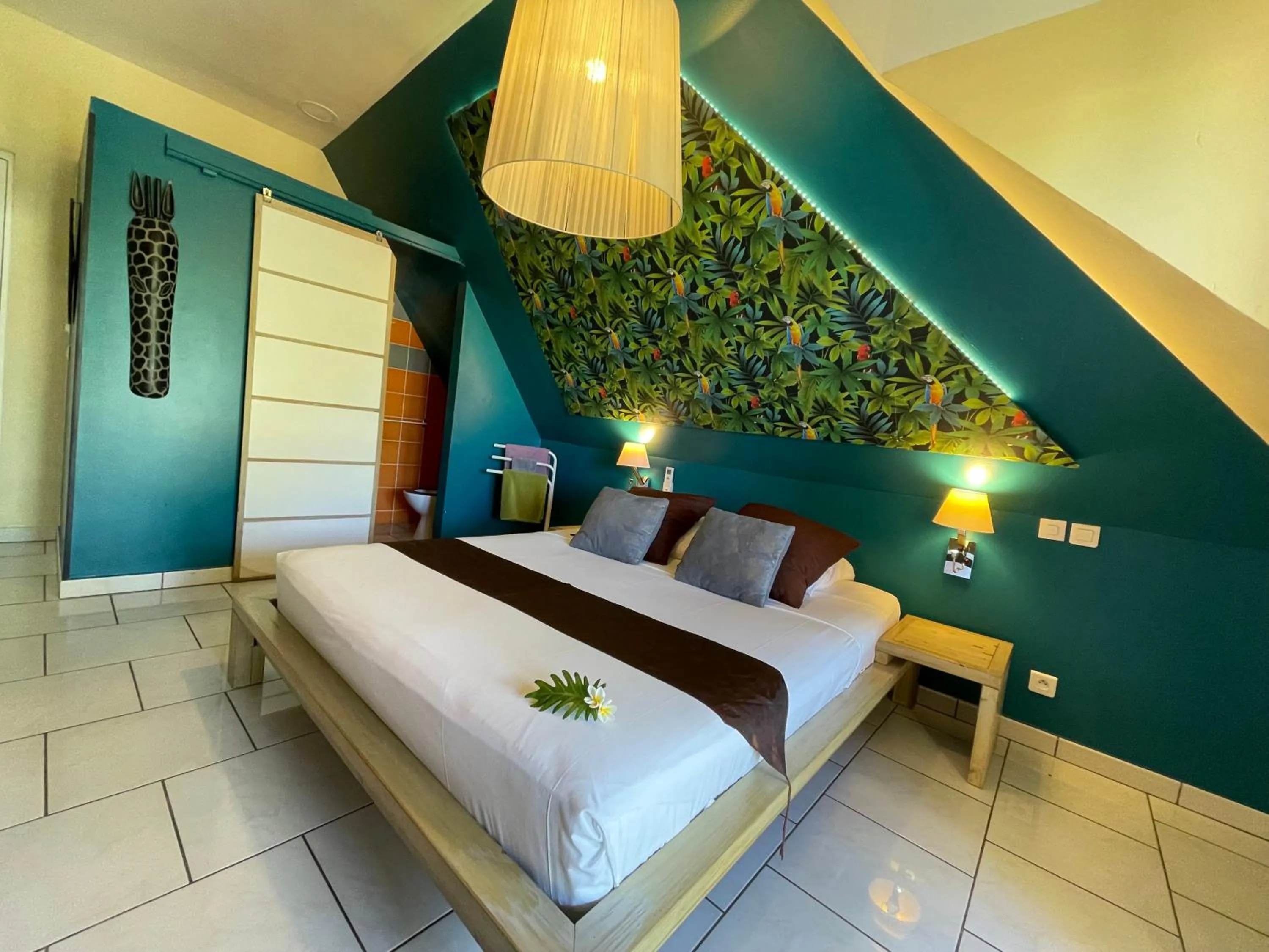 Photo of the whole room, Bed in Hôtel les Bougainvilliers