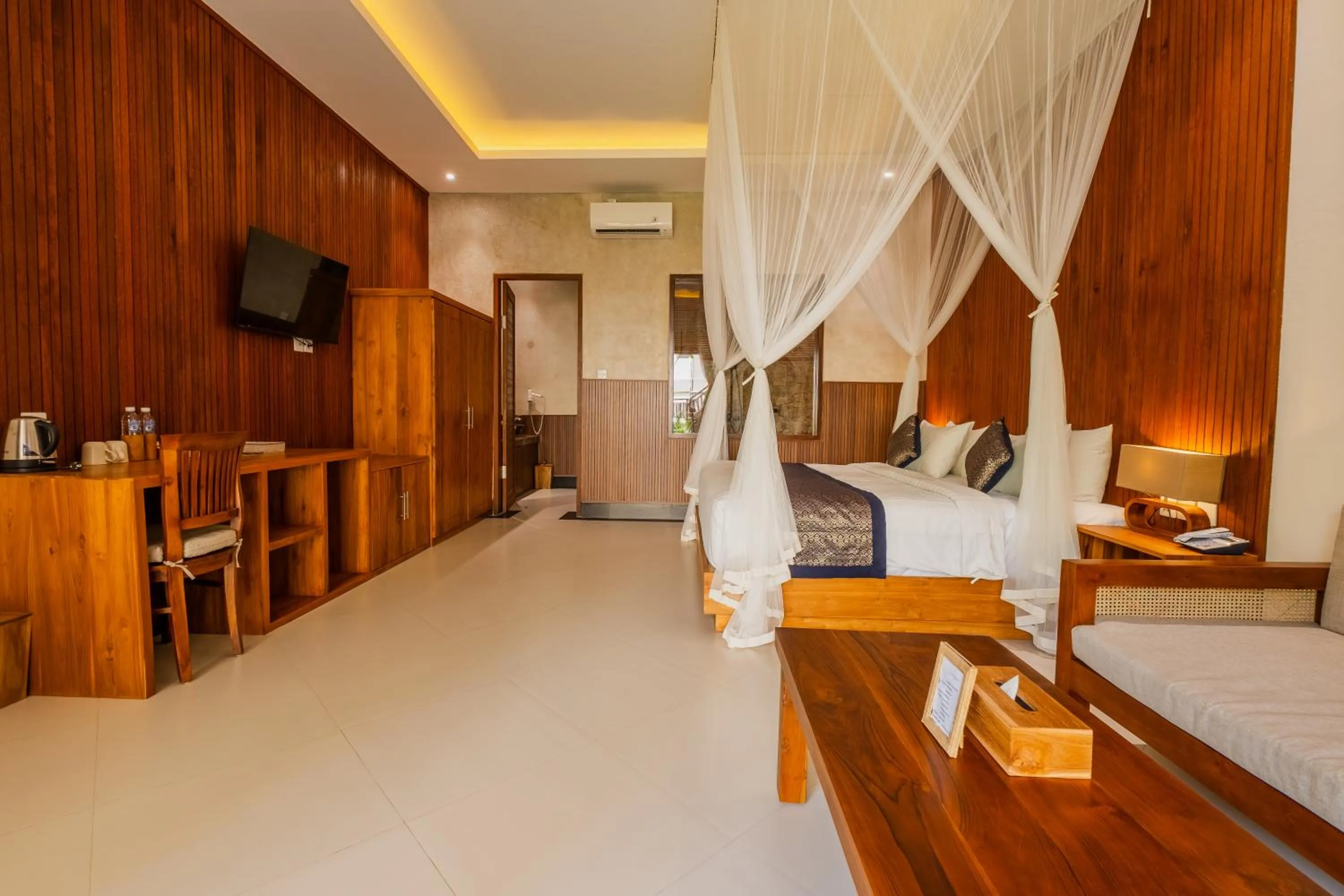 Bed in Alamdini Resort Ubud