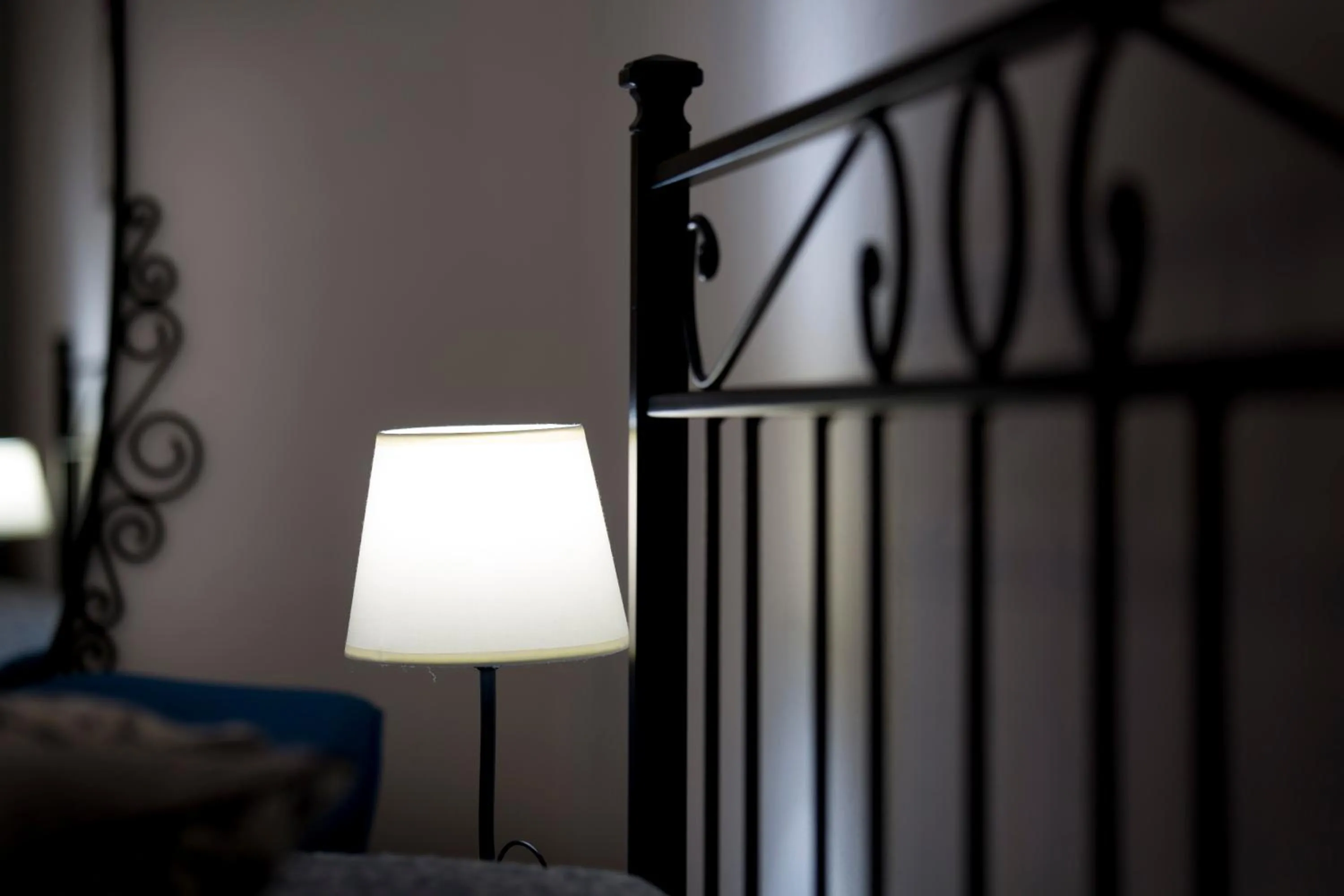 Decorative detail, Bed in La Corte Apartment