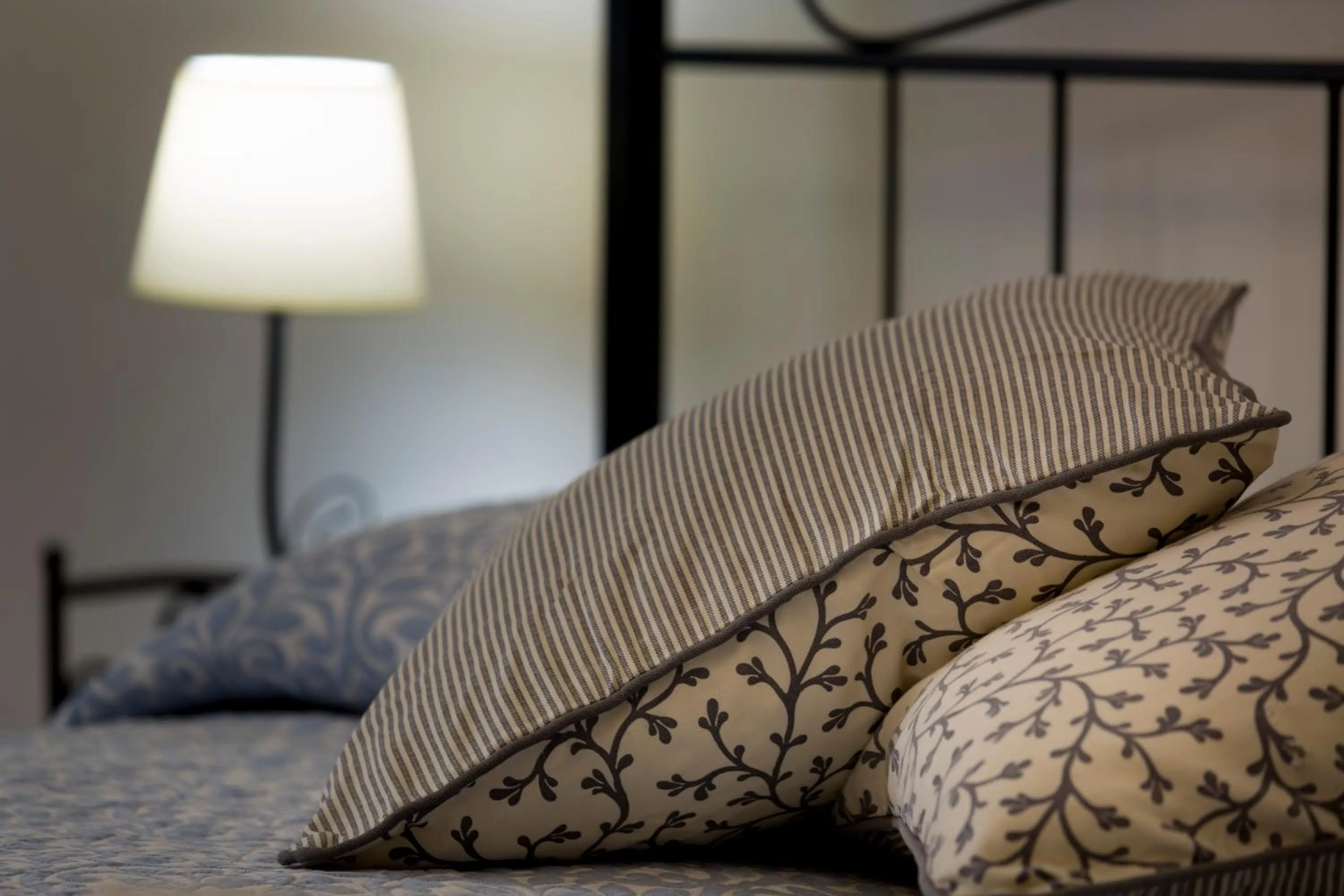 Decorative detail, Bed in La Corte Apartment