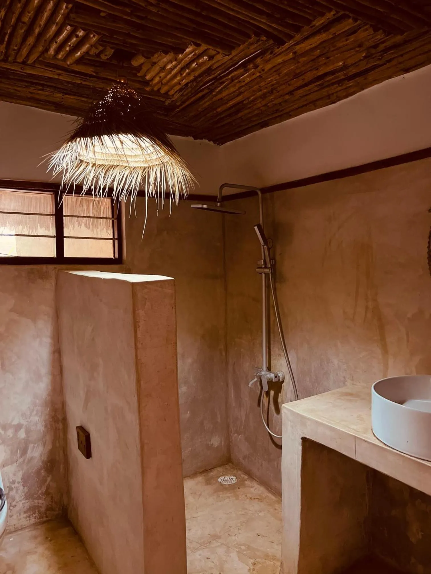 Shower in Mpole Bungalows