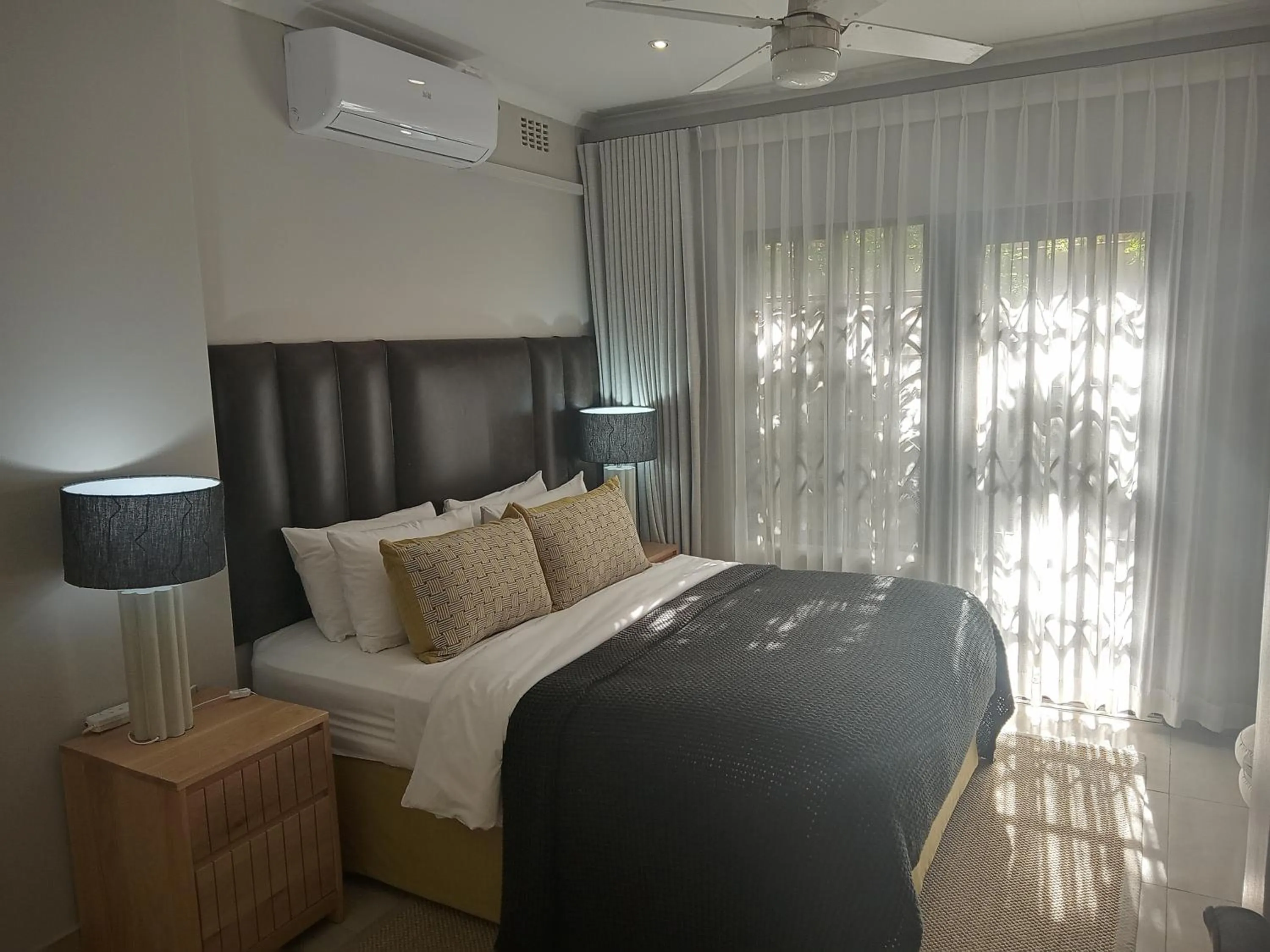 Bed in Tropical Beach Boutique Guesthouse