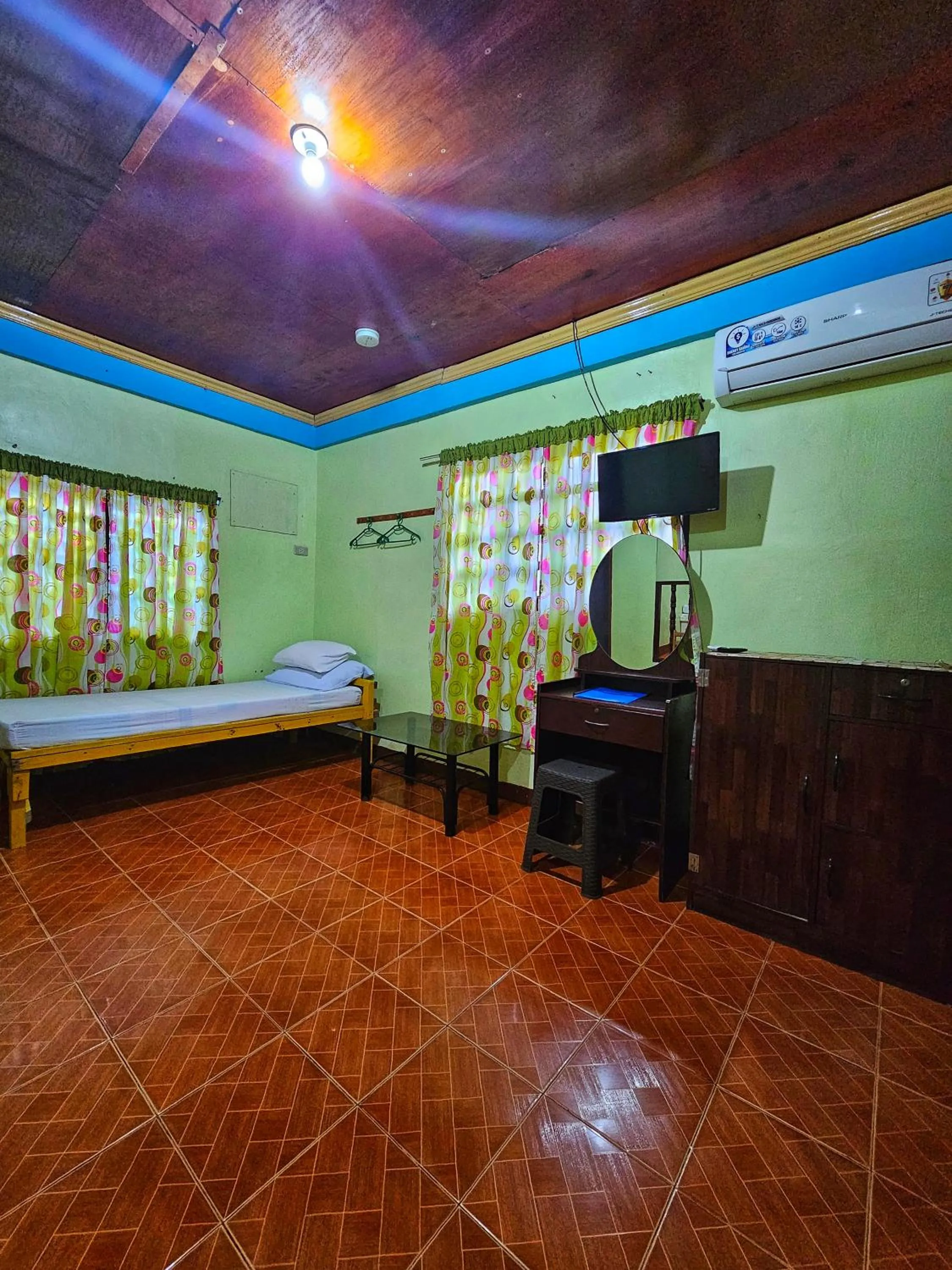 Bed in Bohol Sea Breeze Cottages and Resort