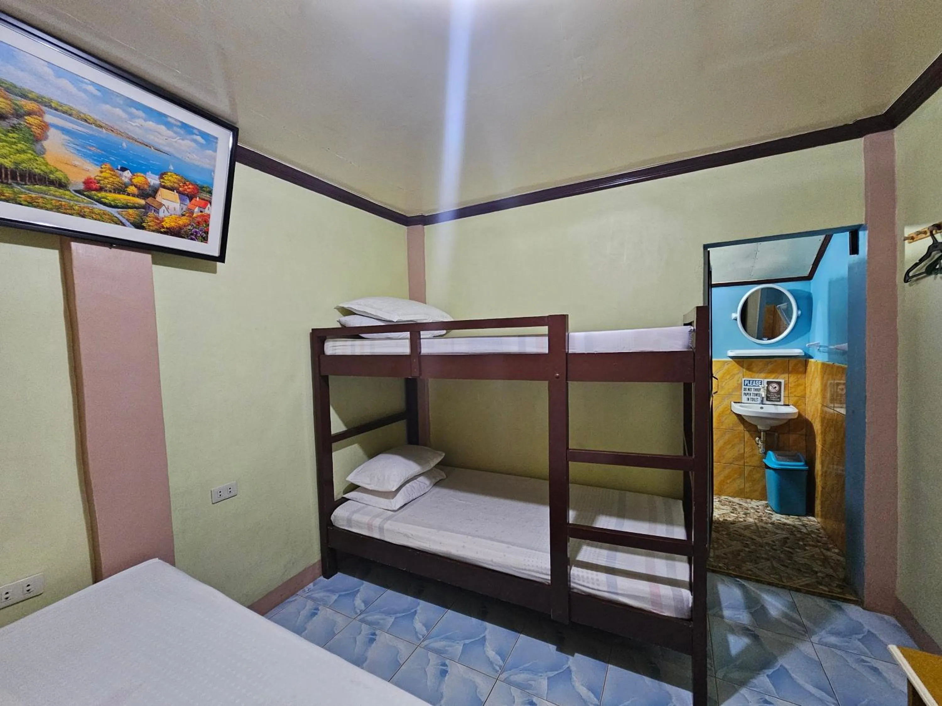 Bed in Bohol Sea Breeze Cottages and Resort