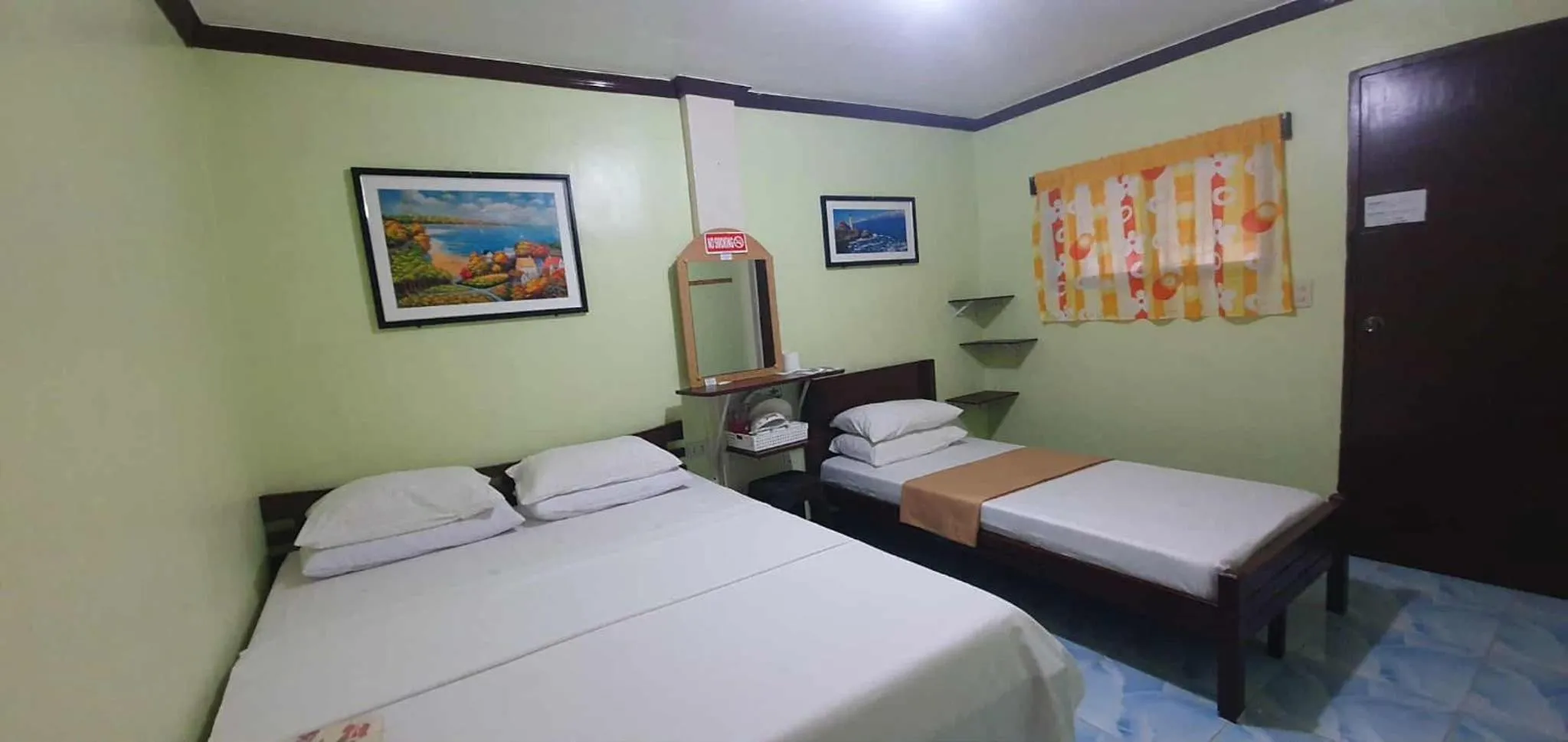 Bed in Bohol Sea Breeze Cottages and Resort