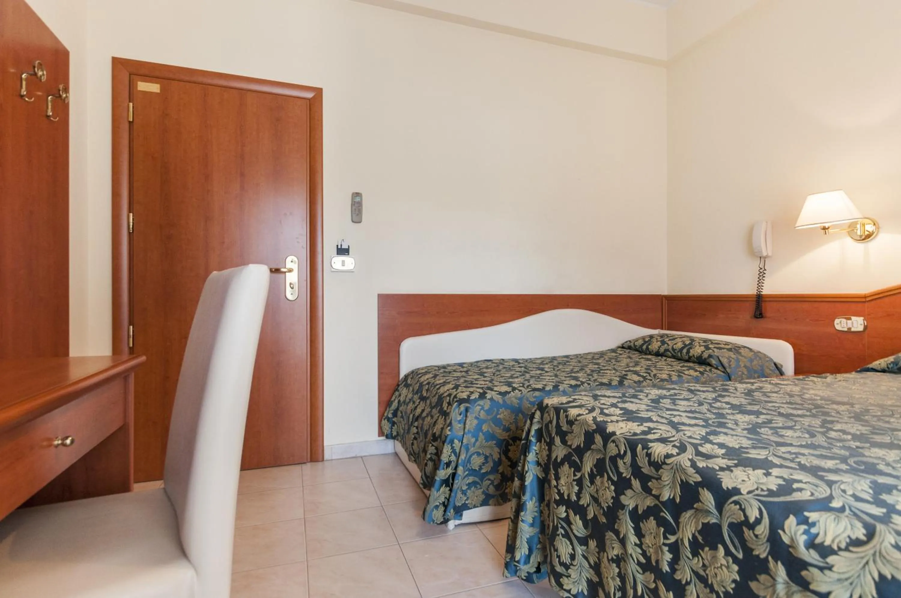 Bed in Hotel Donatella Pinarella