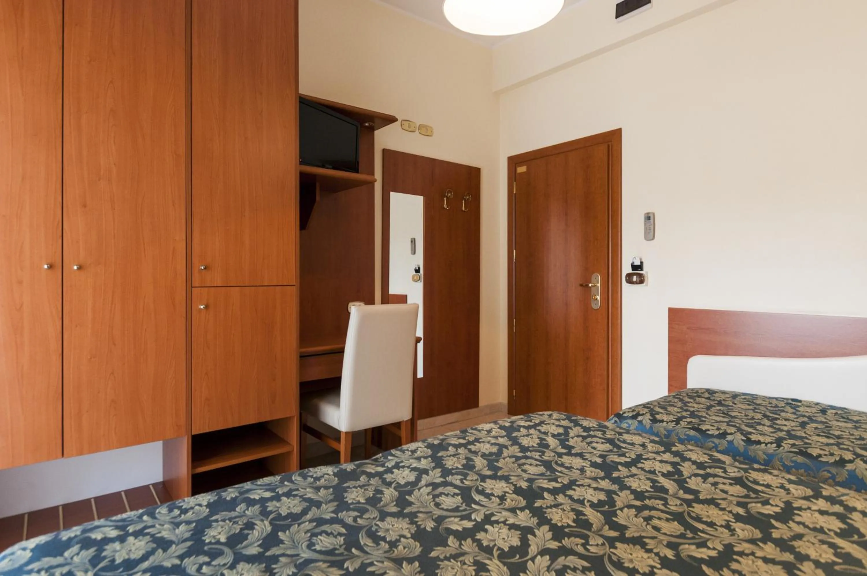 Bed in Hotel Donatella Pinarella