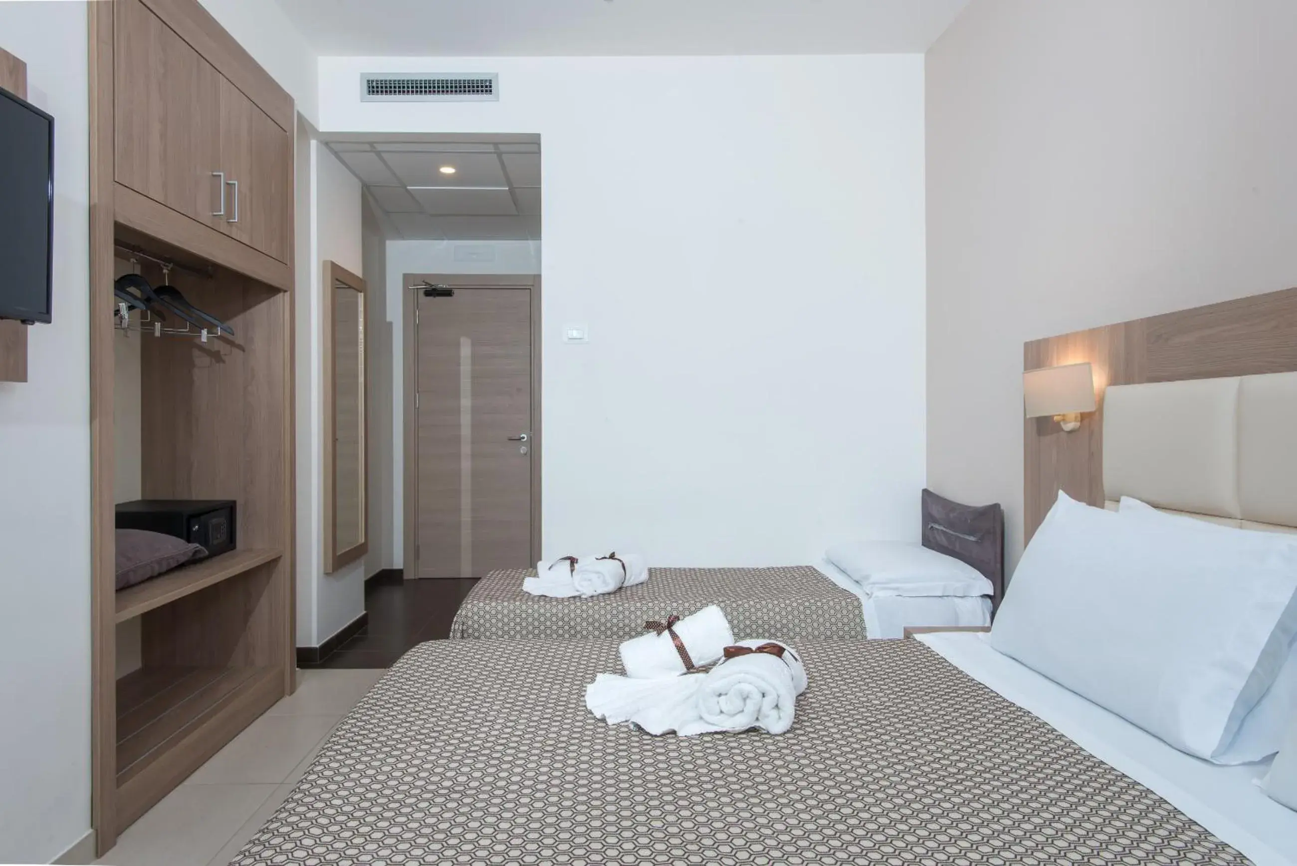 Triple Room in Hotel St. Giorgio Triple Room in Hotel St. Giorgio