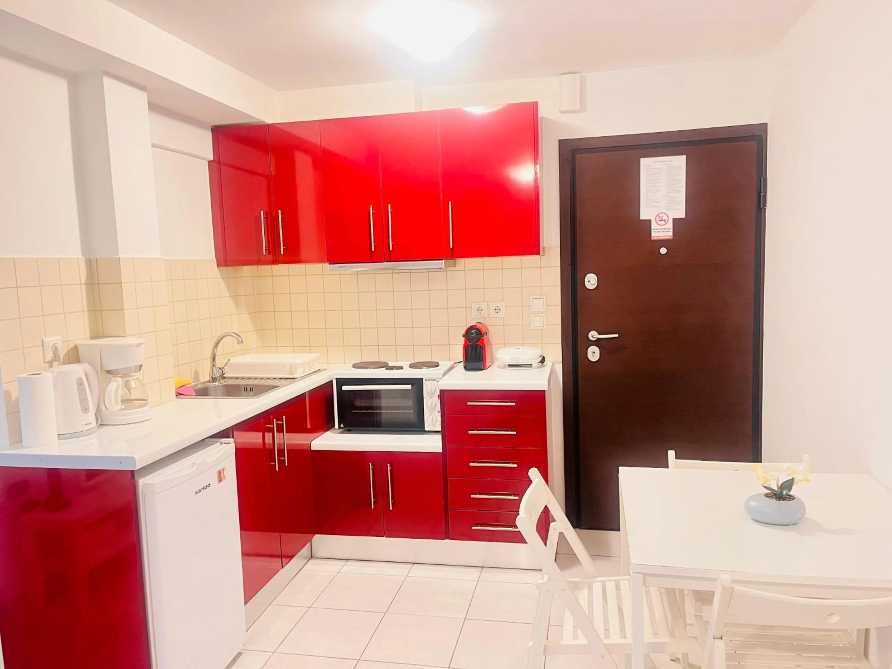 Kitchen or kitchenette in Elvita Apartments
