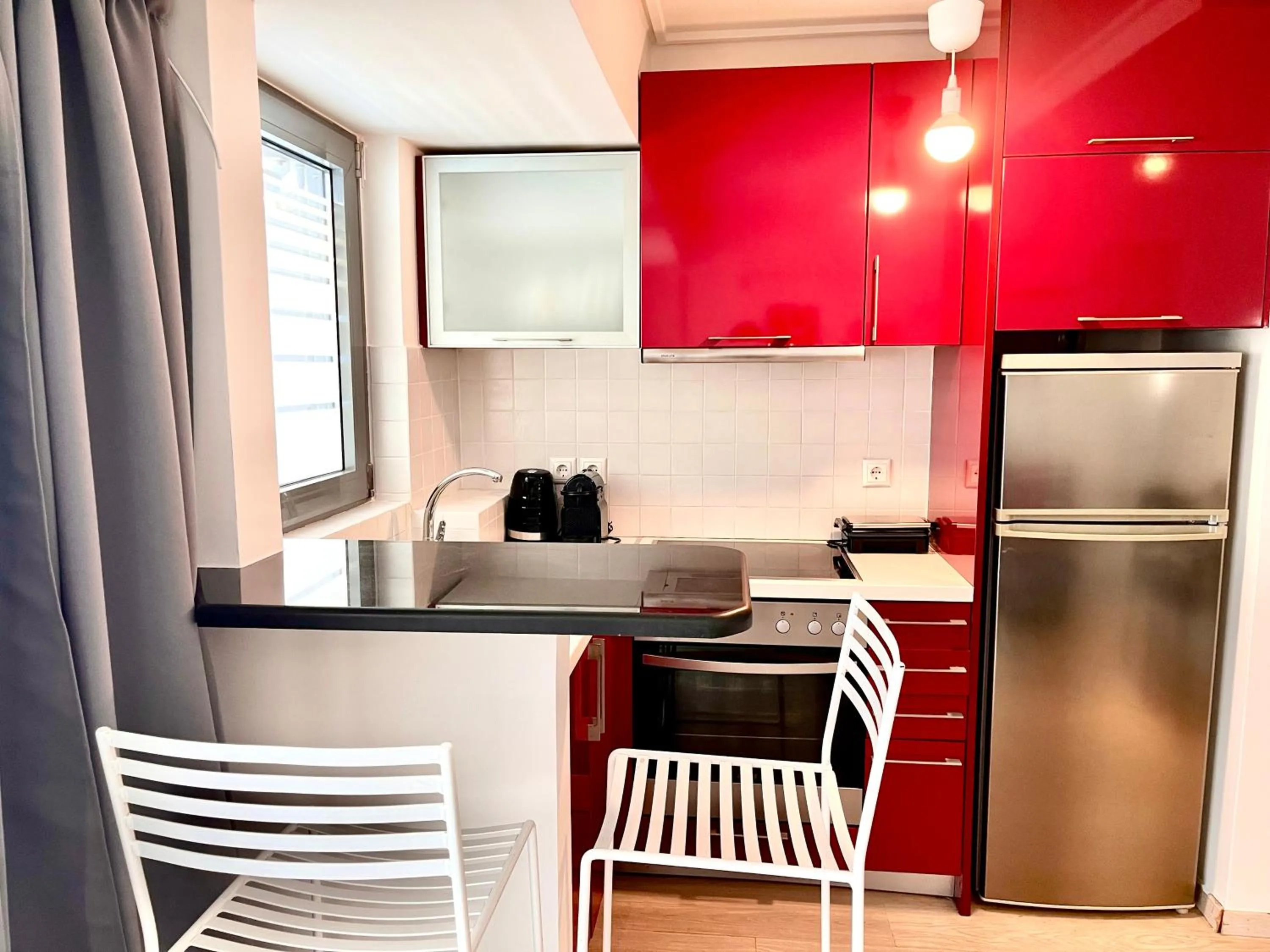 Kitchen or kitchenette in Elvita Apartments