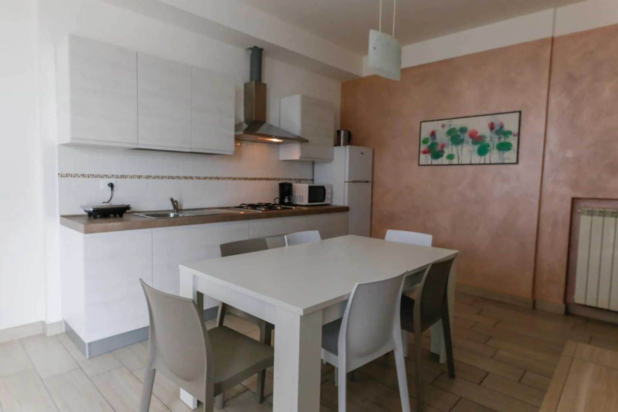 Kitchen or kitchenette in Appartamenti Residence Tulipano