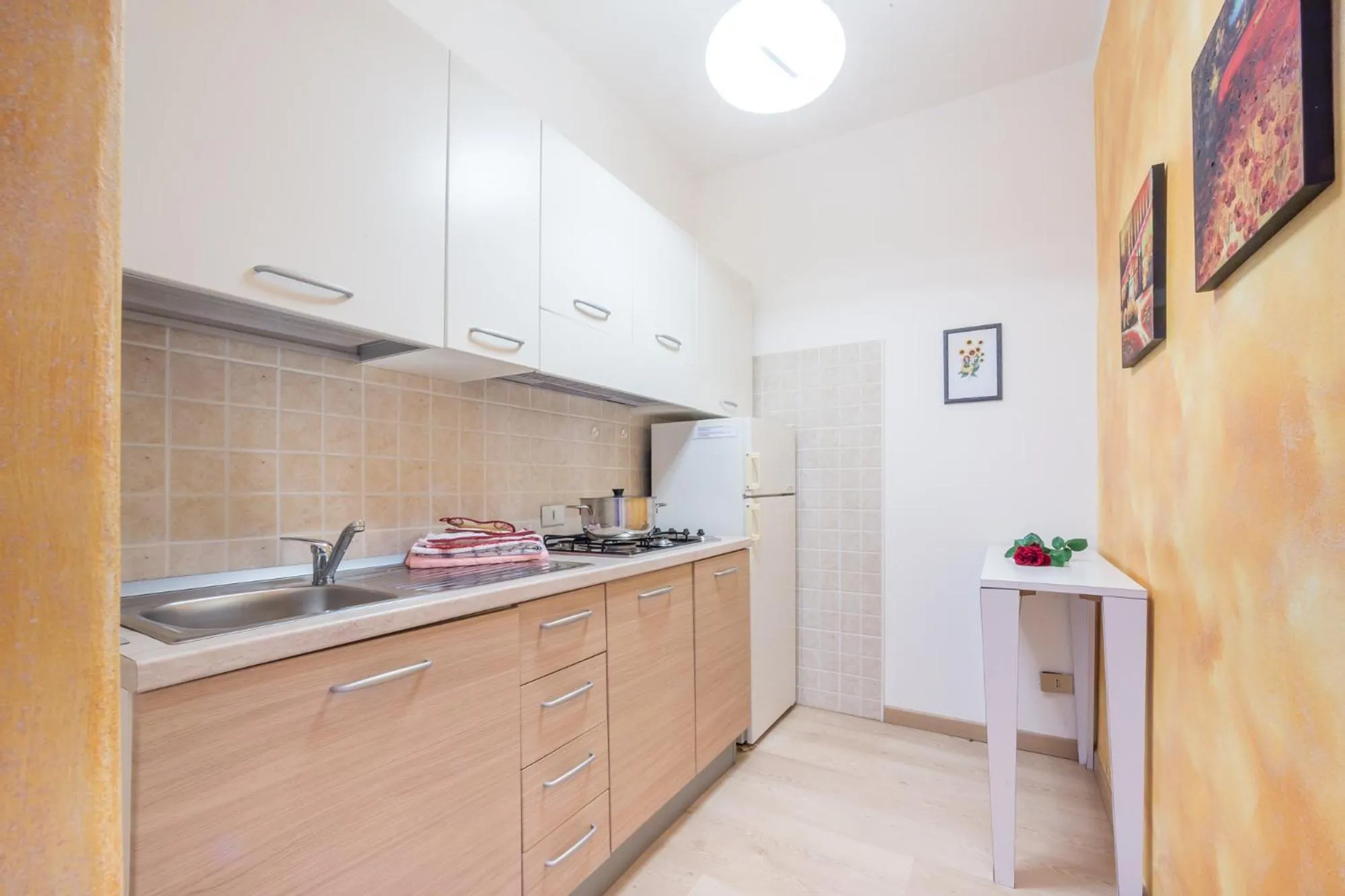 Kitchen or kitchenette in Appartamenti Residence Tulipano