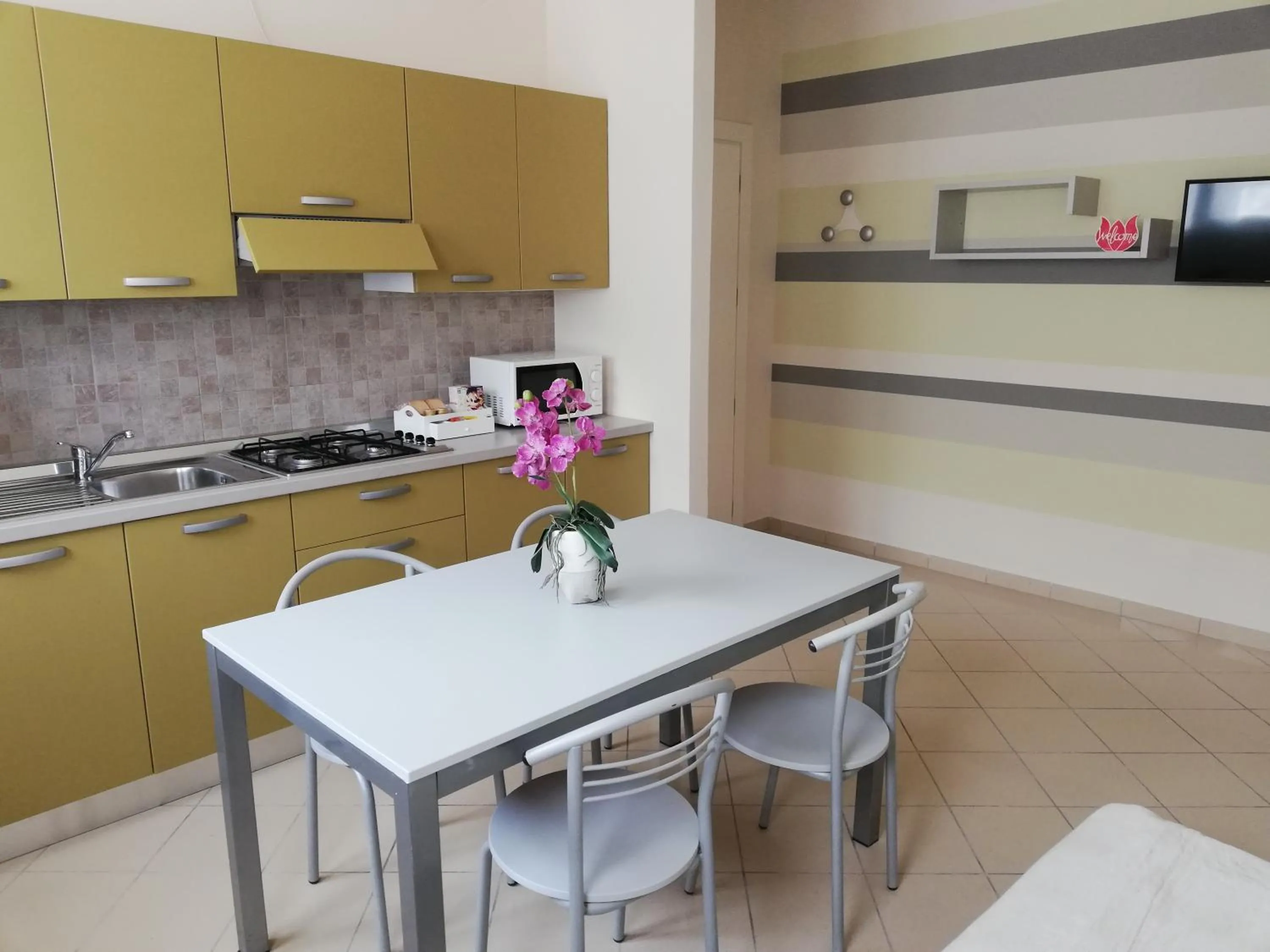 Kitchen or kitchenette in Appartamenti Residence Tulipano