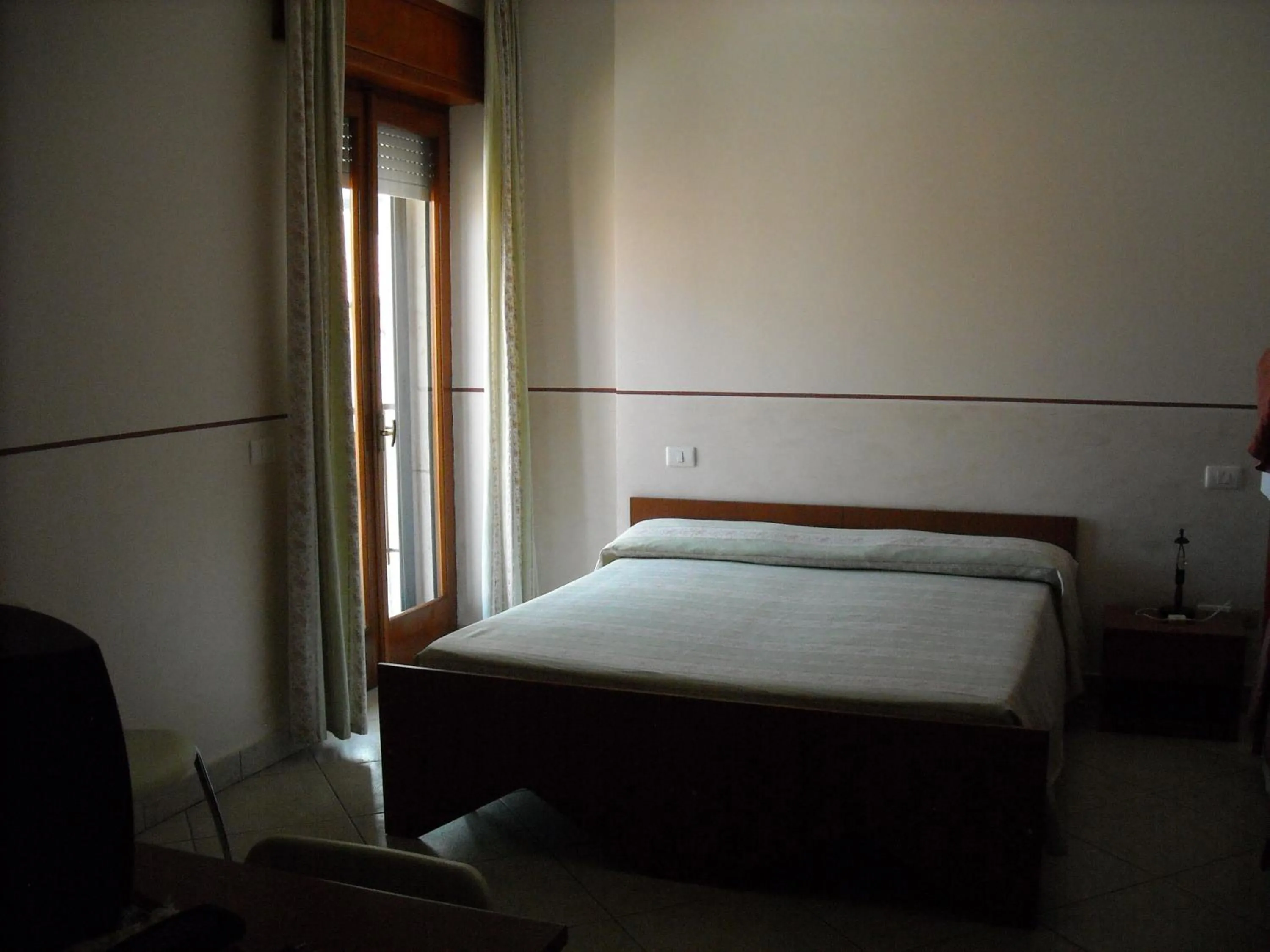 Bed in Hotel Caimo Bed-Breakfast