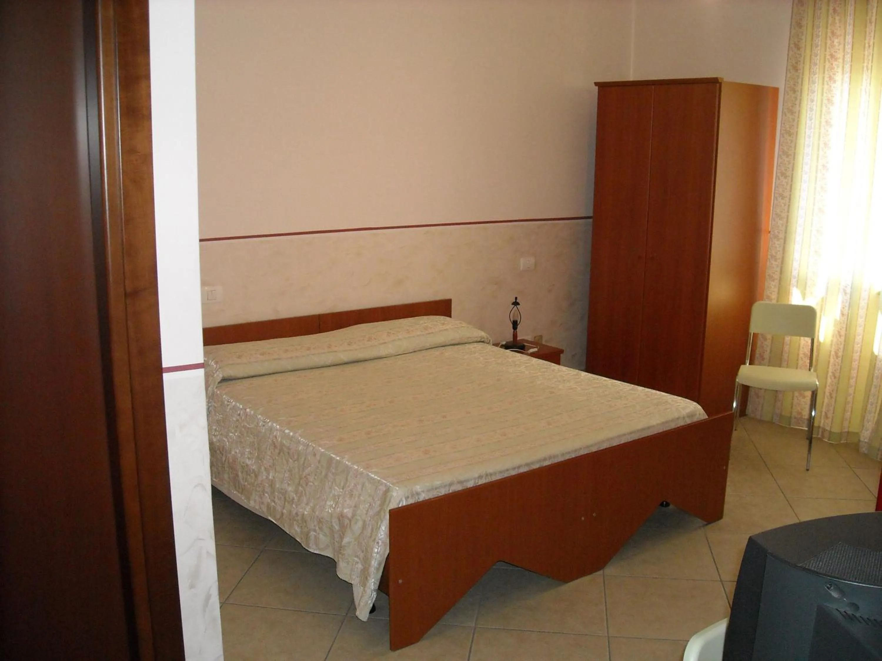Bed in Hotel Caimo Bed-Breakfast
