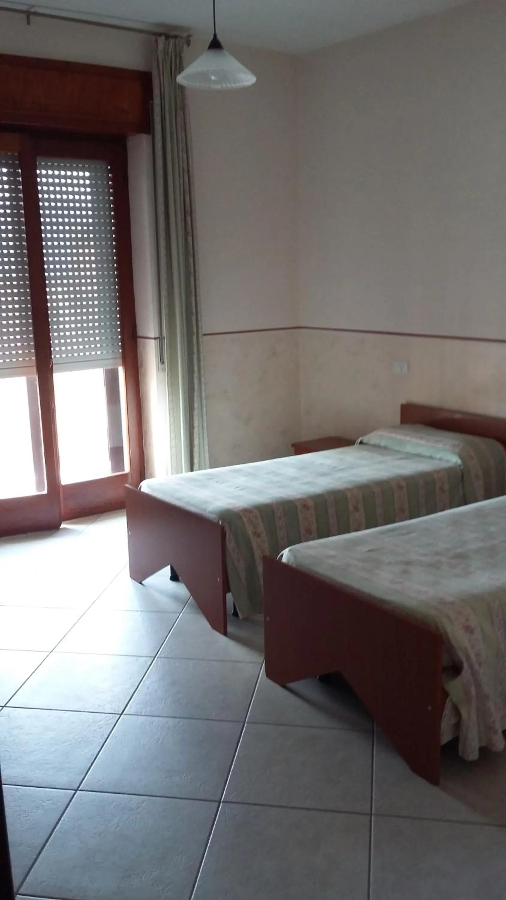 Bed in Hotel Caimo Bed-Breakfast