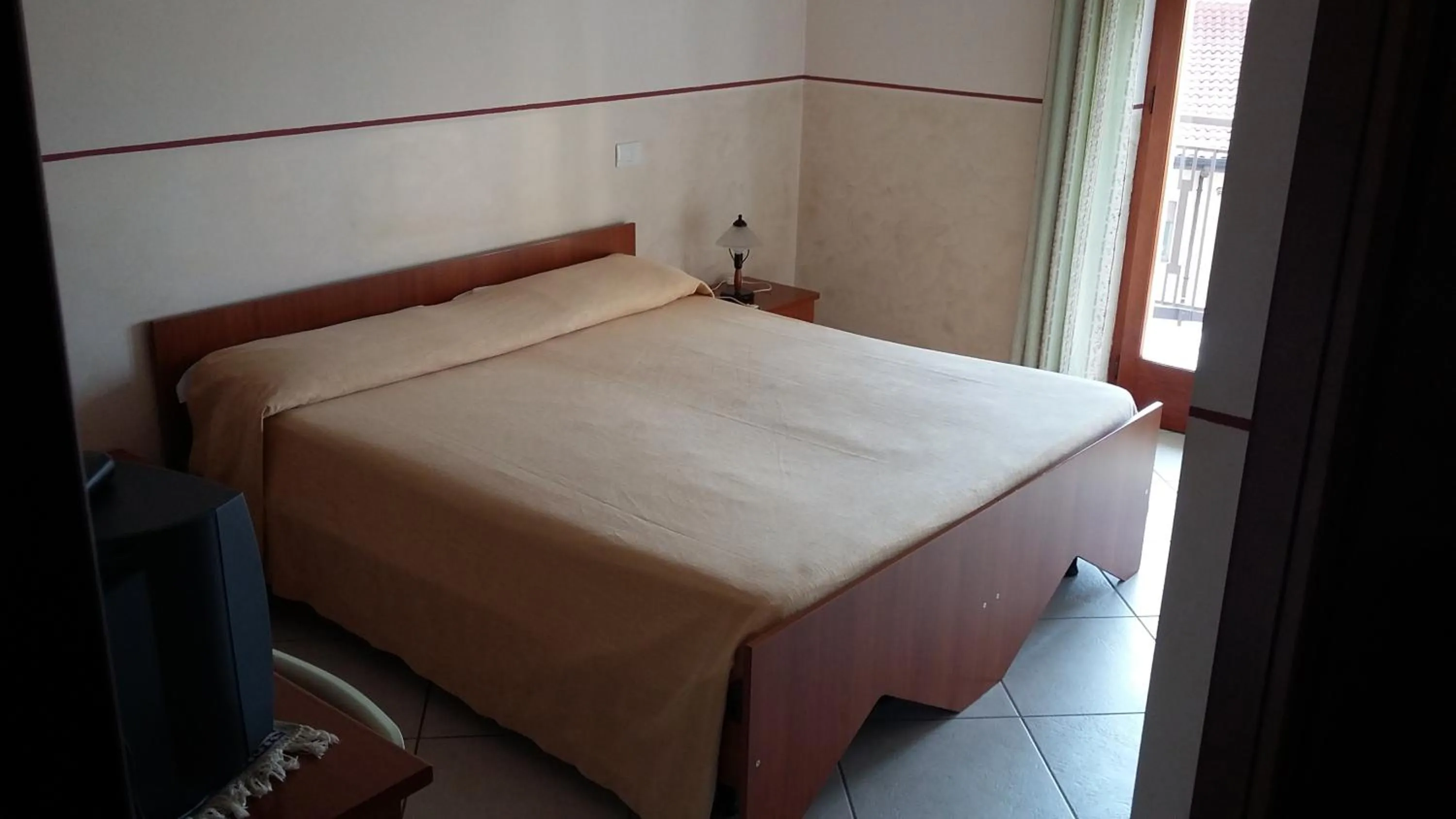Bed in Hotel Caimo Bed-Breakfast
