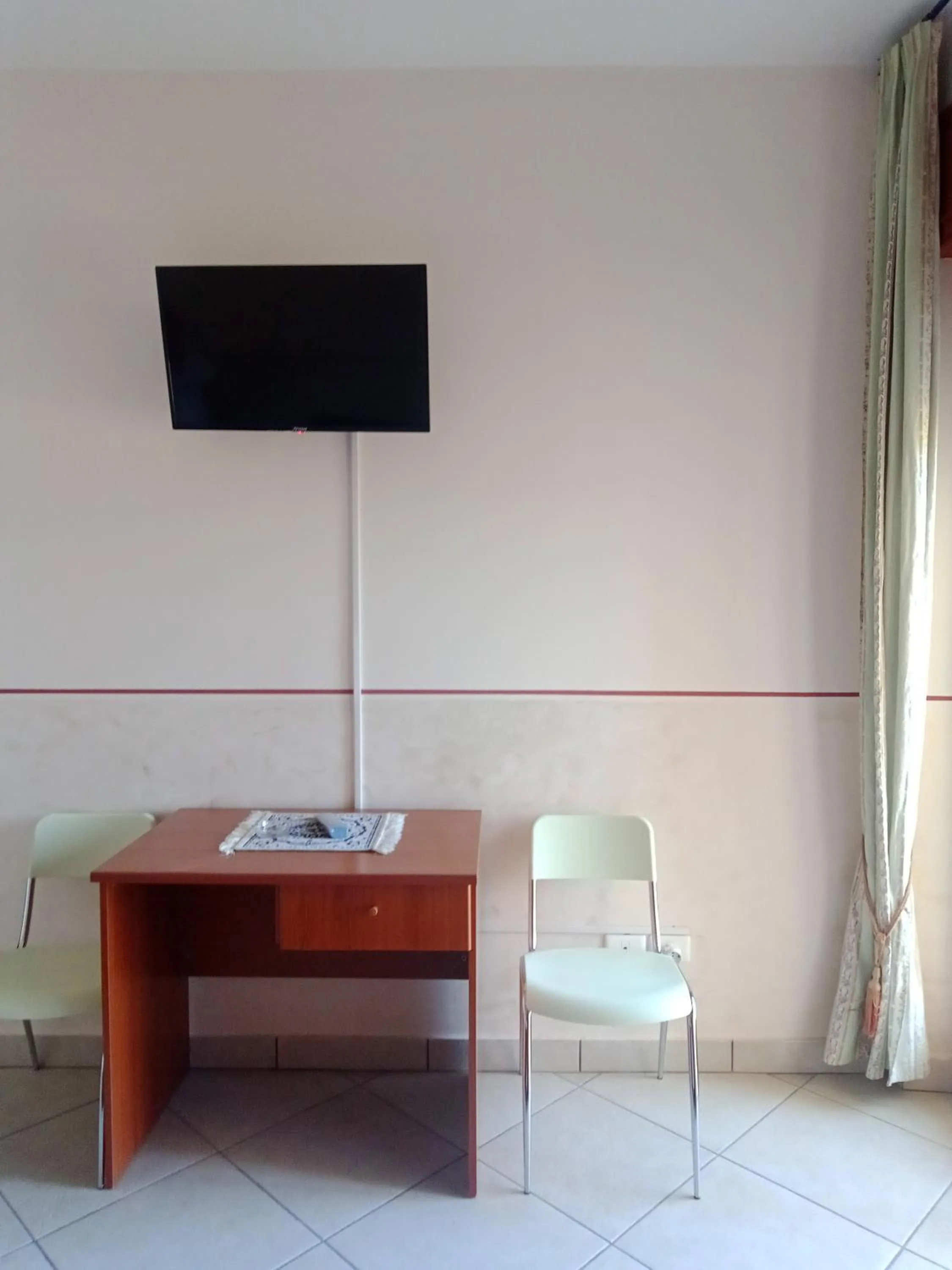 Seating area in Hotel Caimo Bed-Breakfast