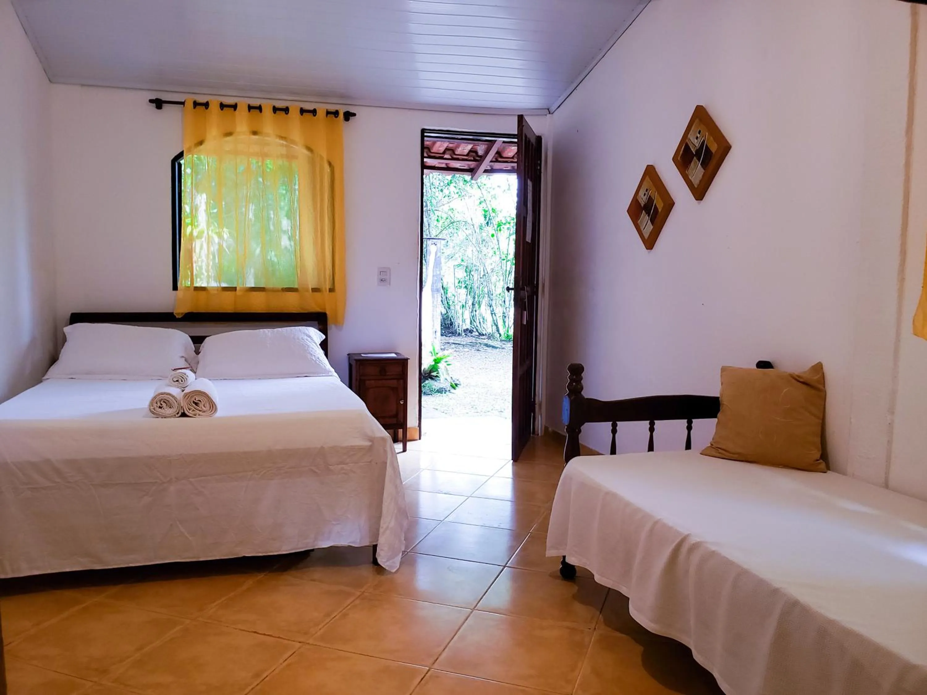 Bed in Pousada Sitio das Flores