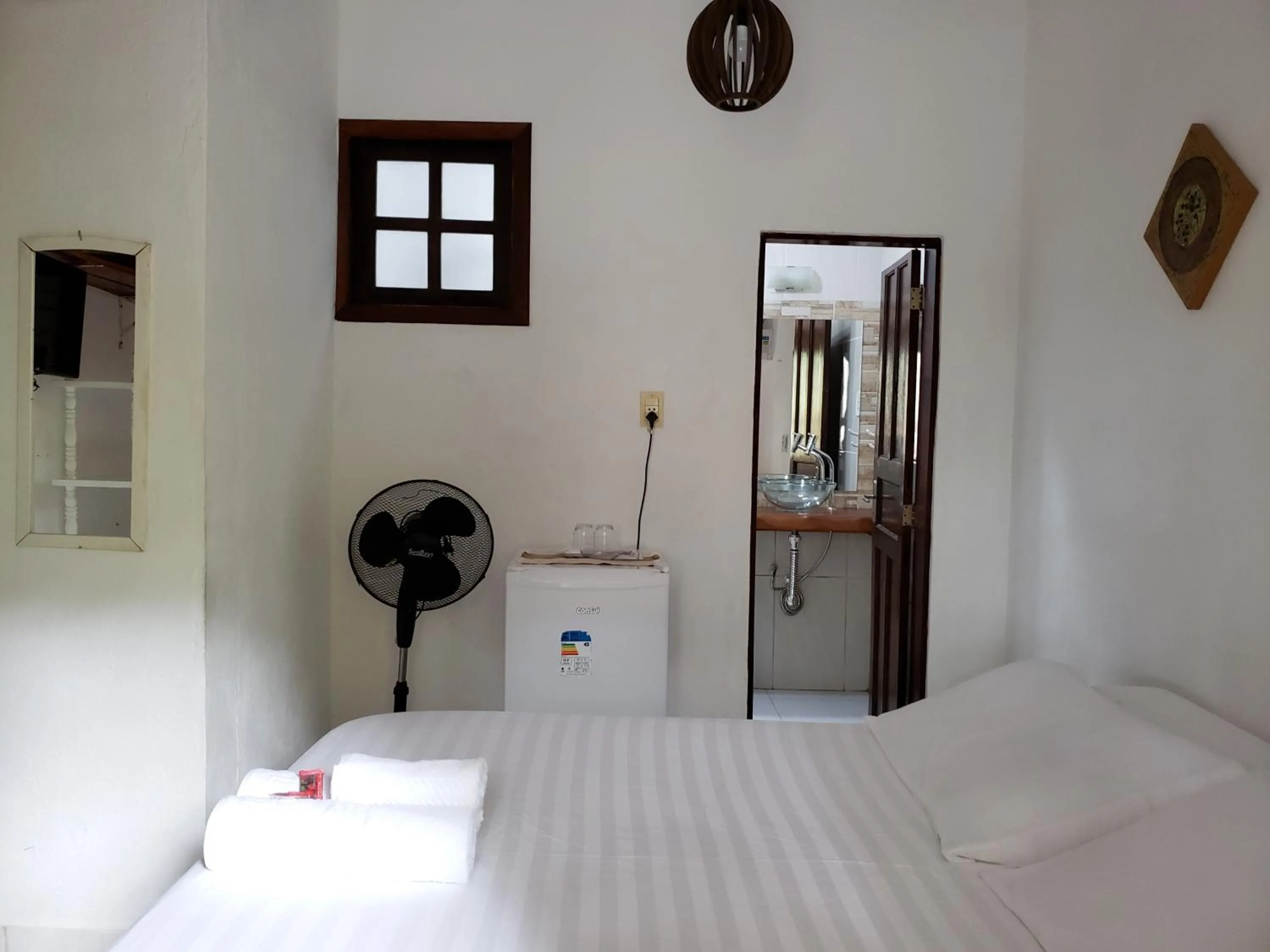 Bed in Pousada Sitio das Flores