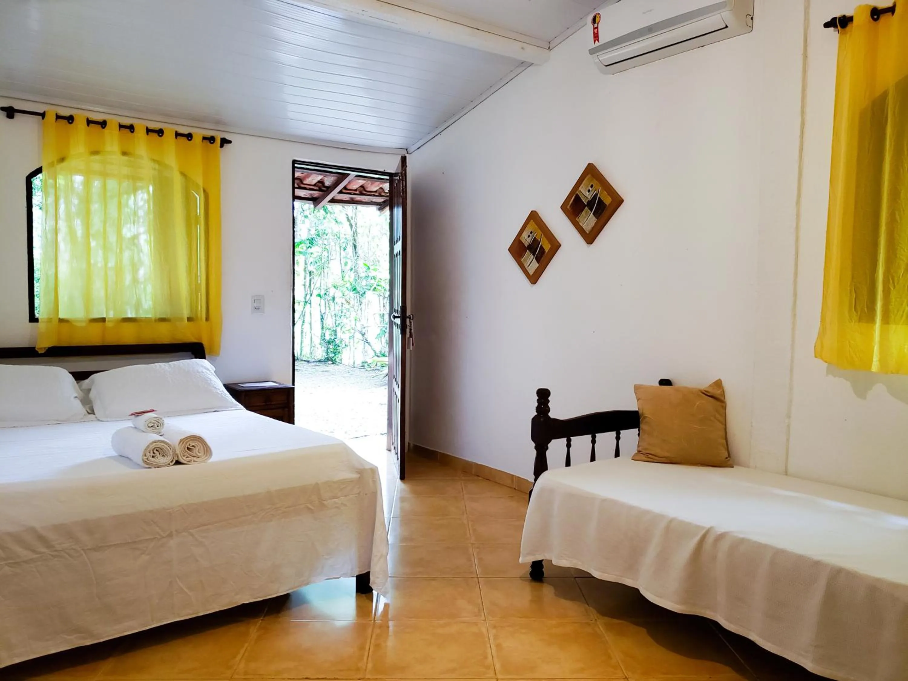 Bed in Pousada Sitio das Flores