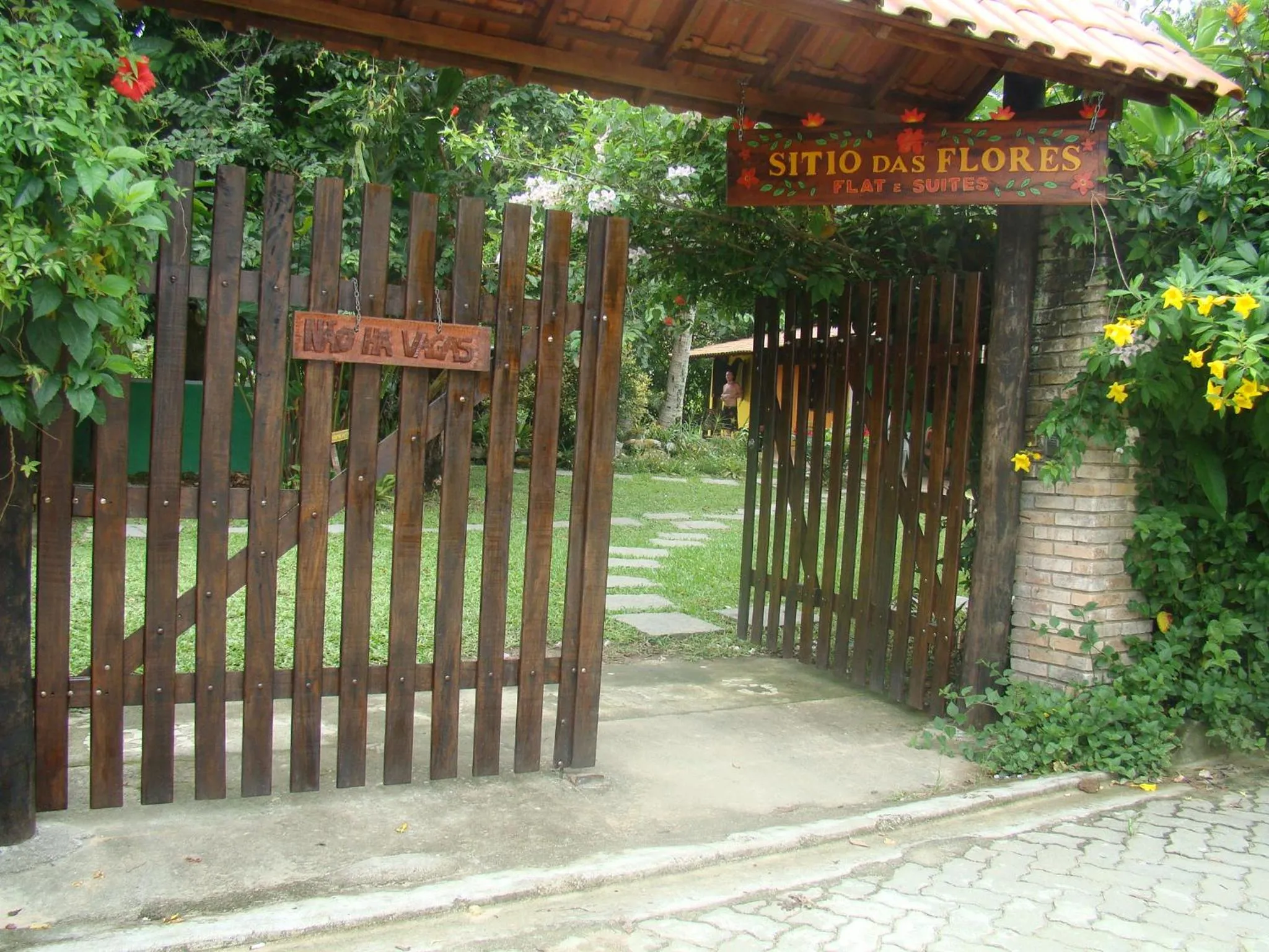Property logo or sign in Pousada Sitio das Flores