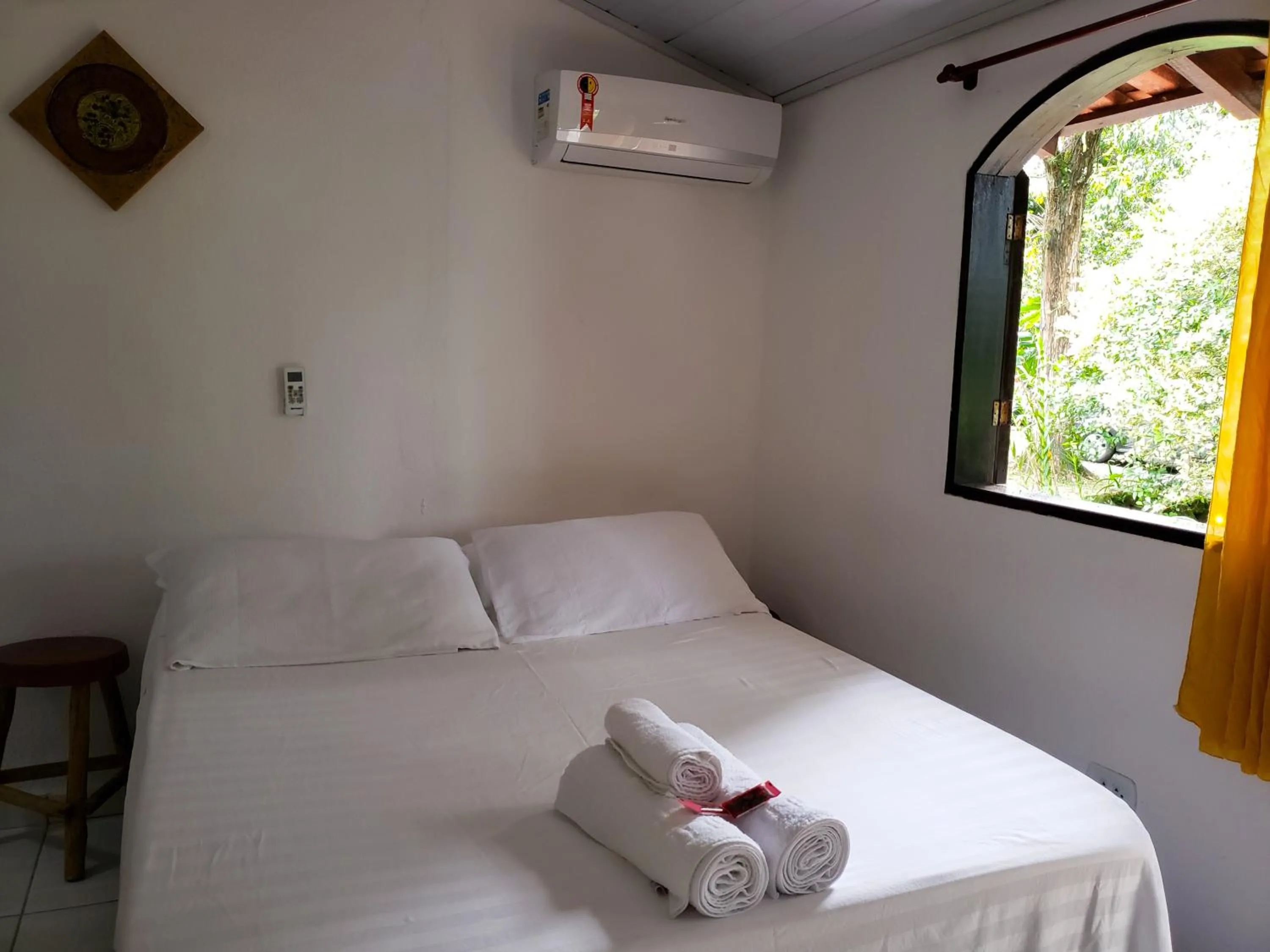Bed in Pousada Sitio das Flores