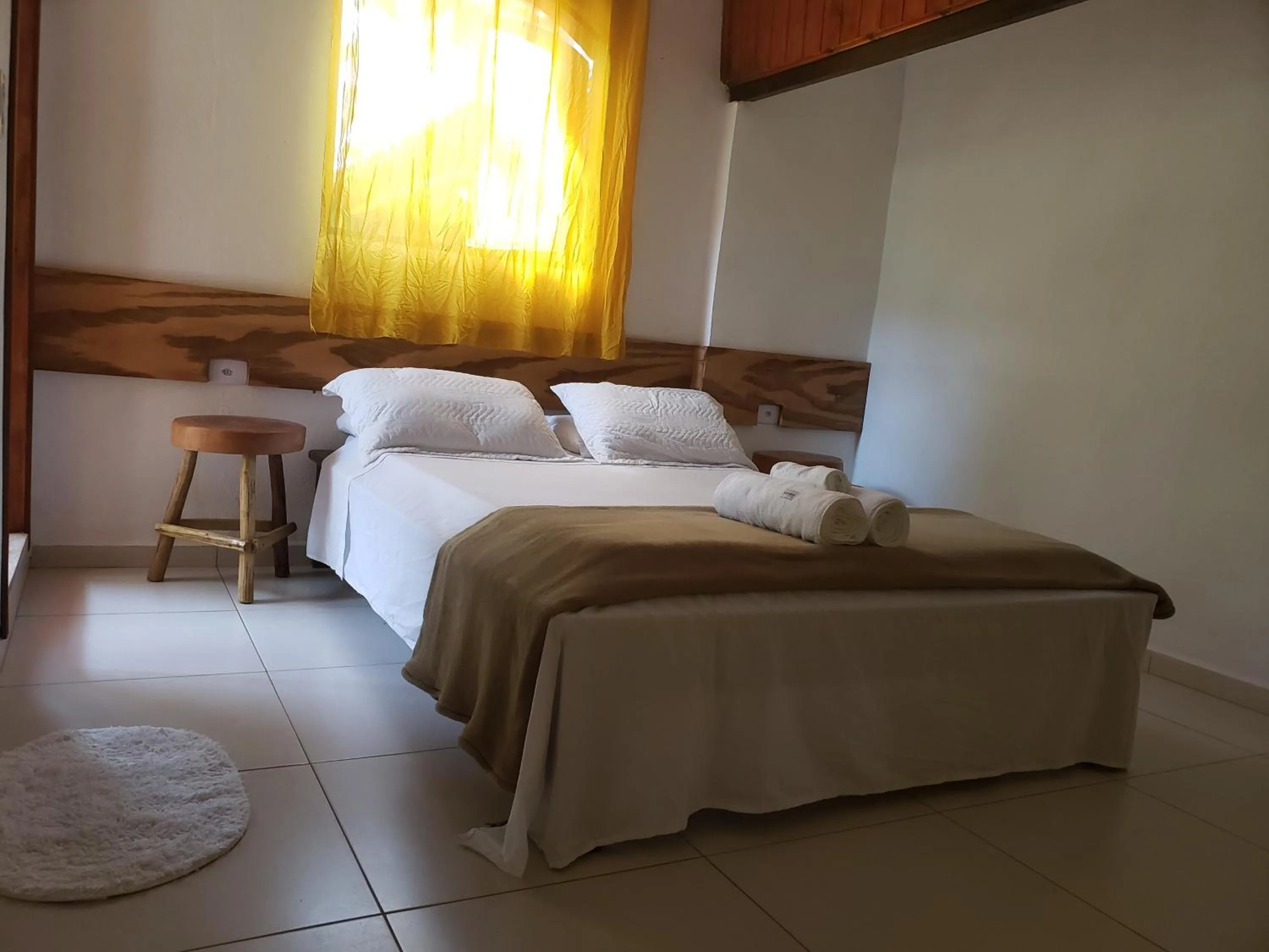Bed in Pousada Sitio das Flores