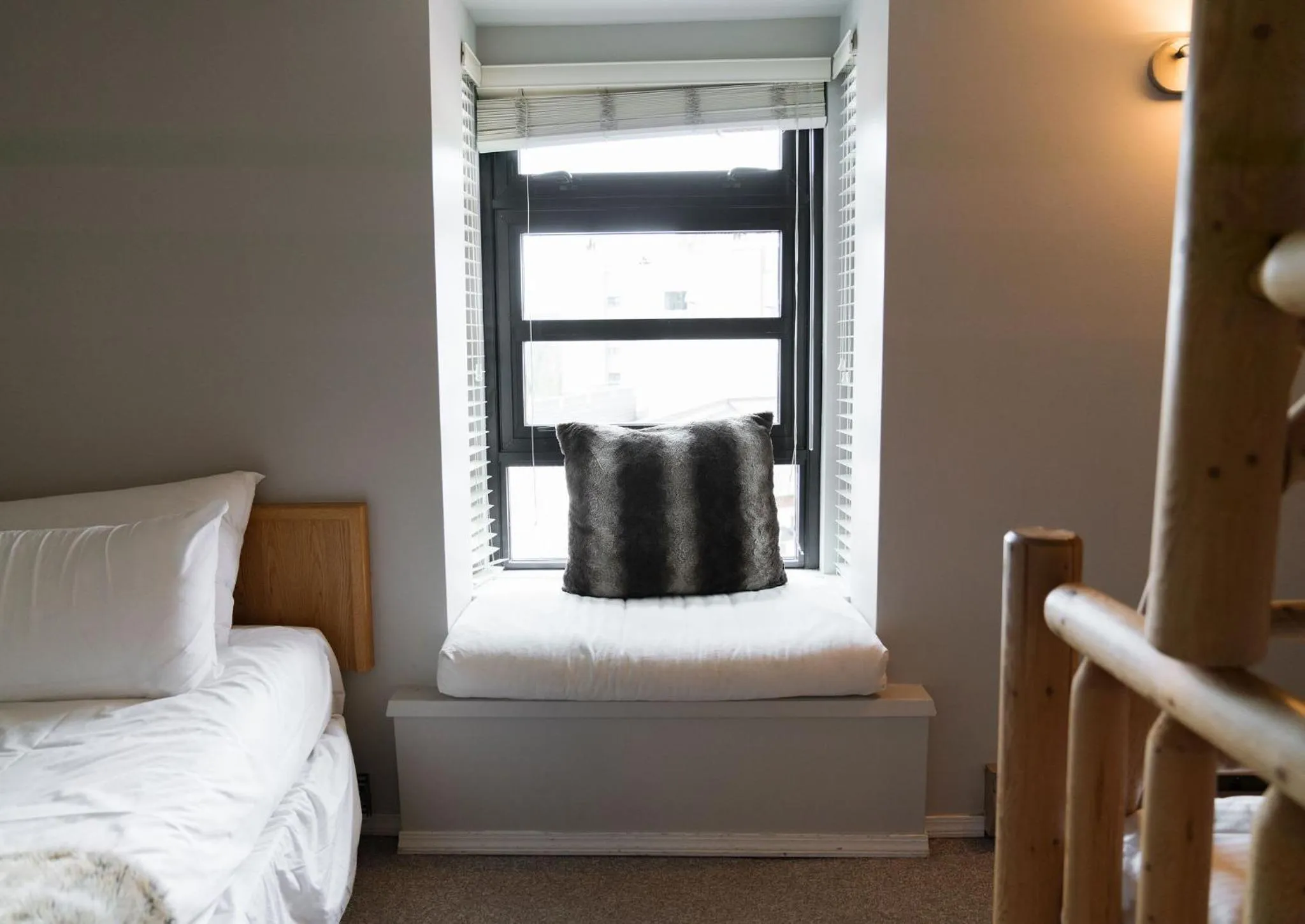 Bed in Gibbons Life Accommodations