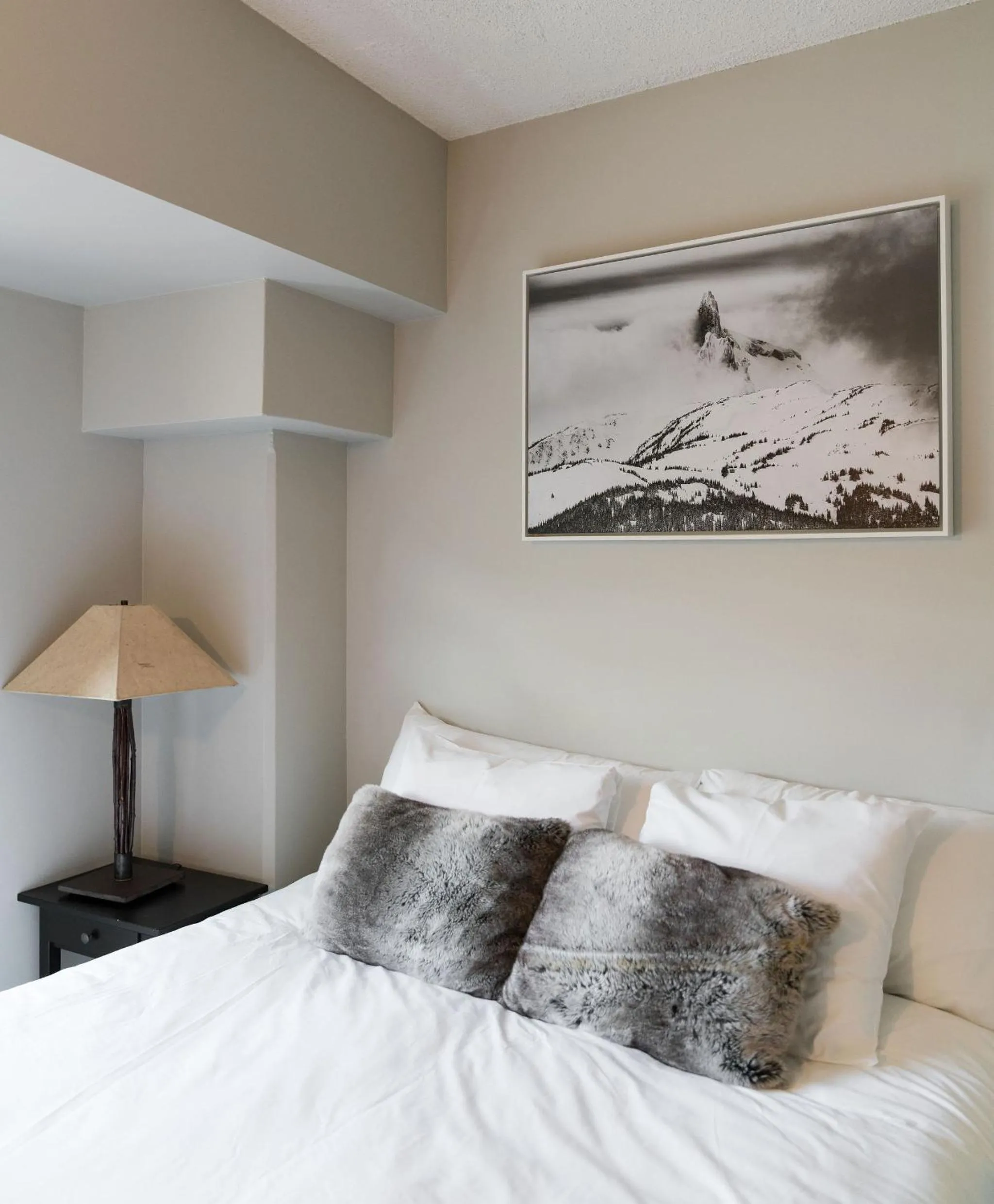 Bed in Gibbons Life Accommodations