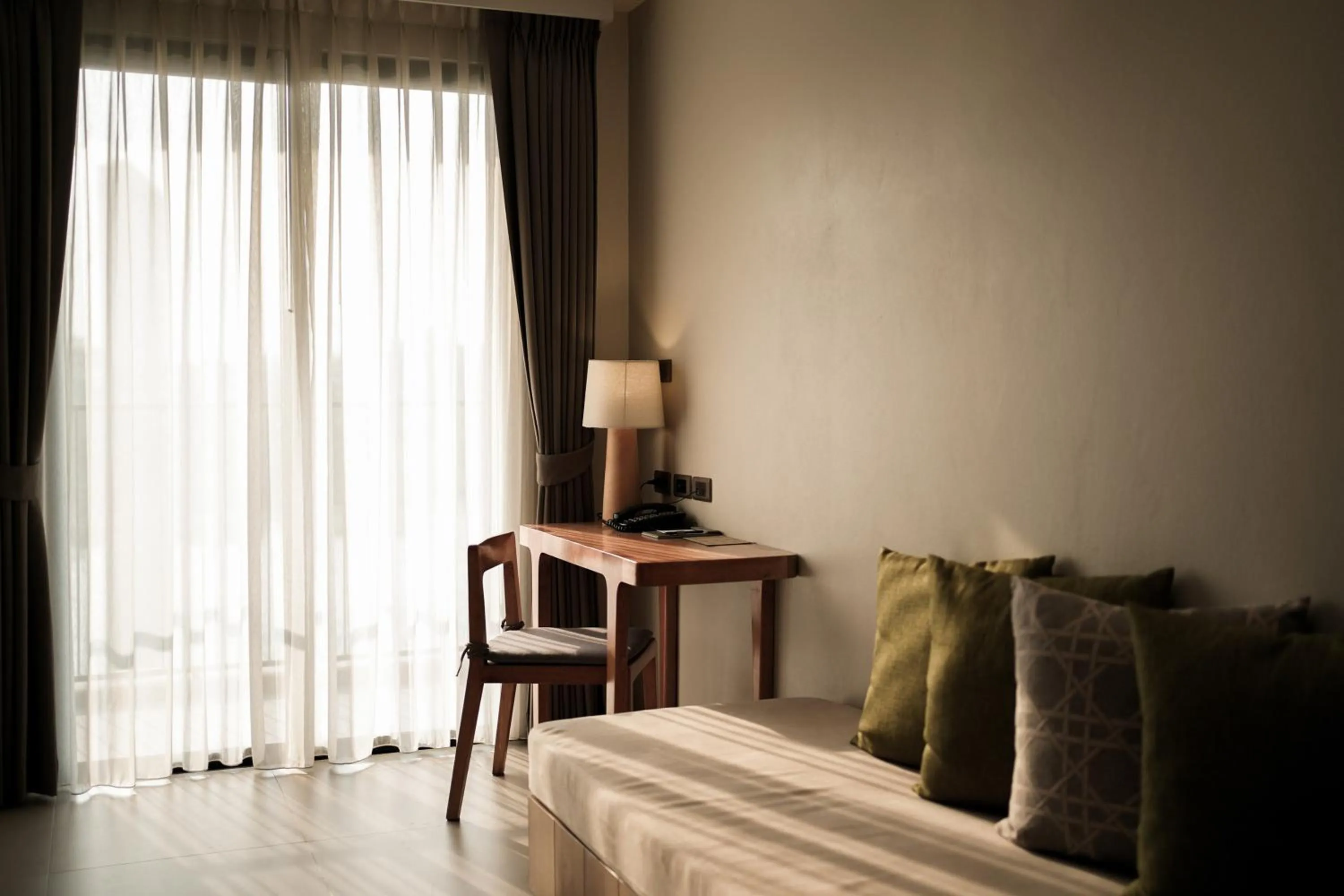 Photo of the whole room, Bed in Brique Hotel Chiangmai