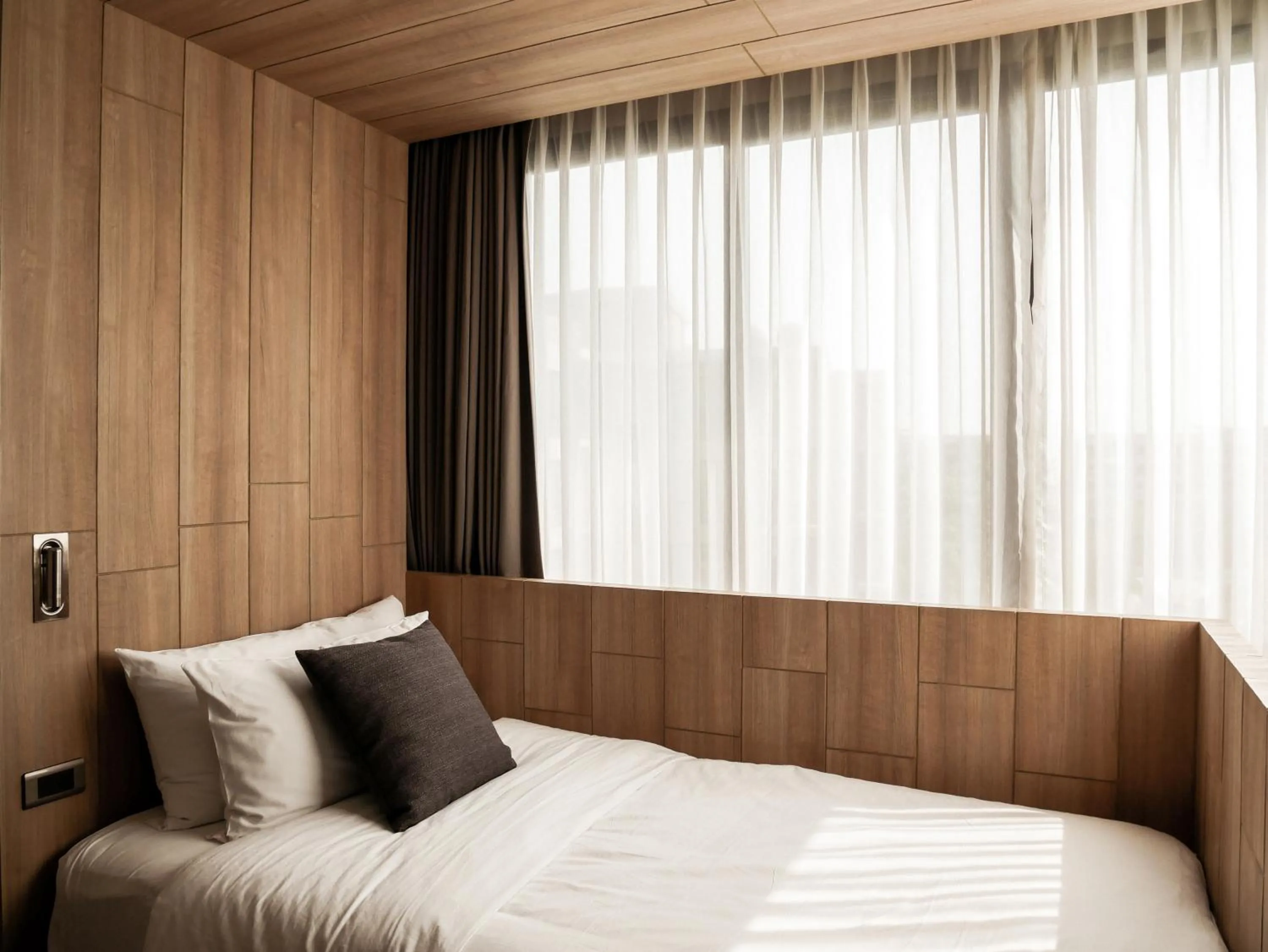 Bed in Brique Hotel Chiangmai