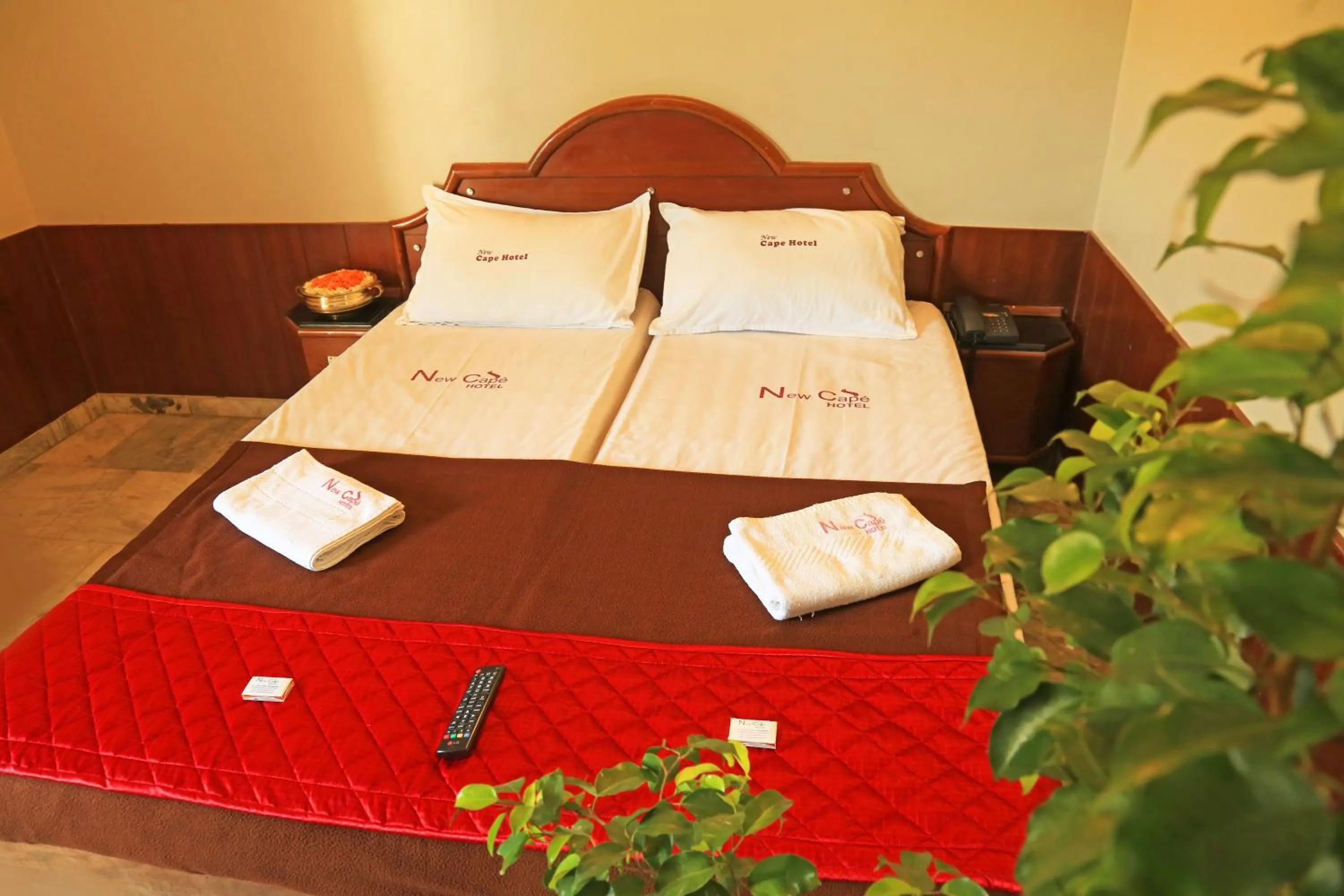 Bed in New Cape Hotel
