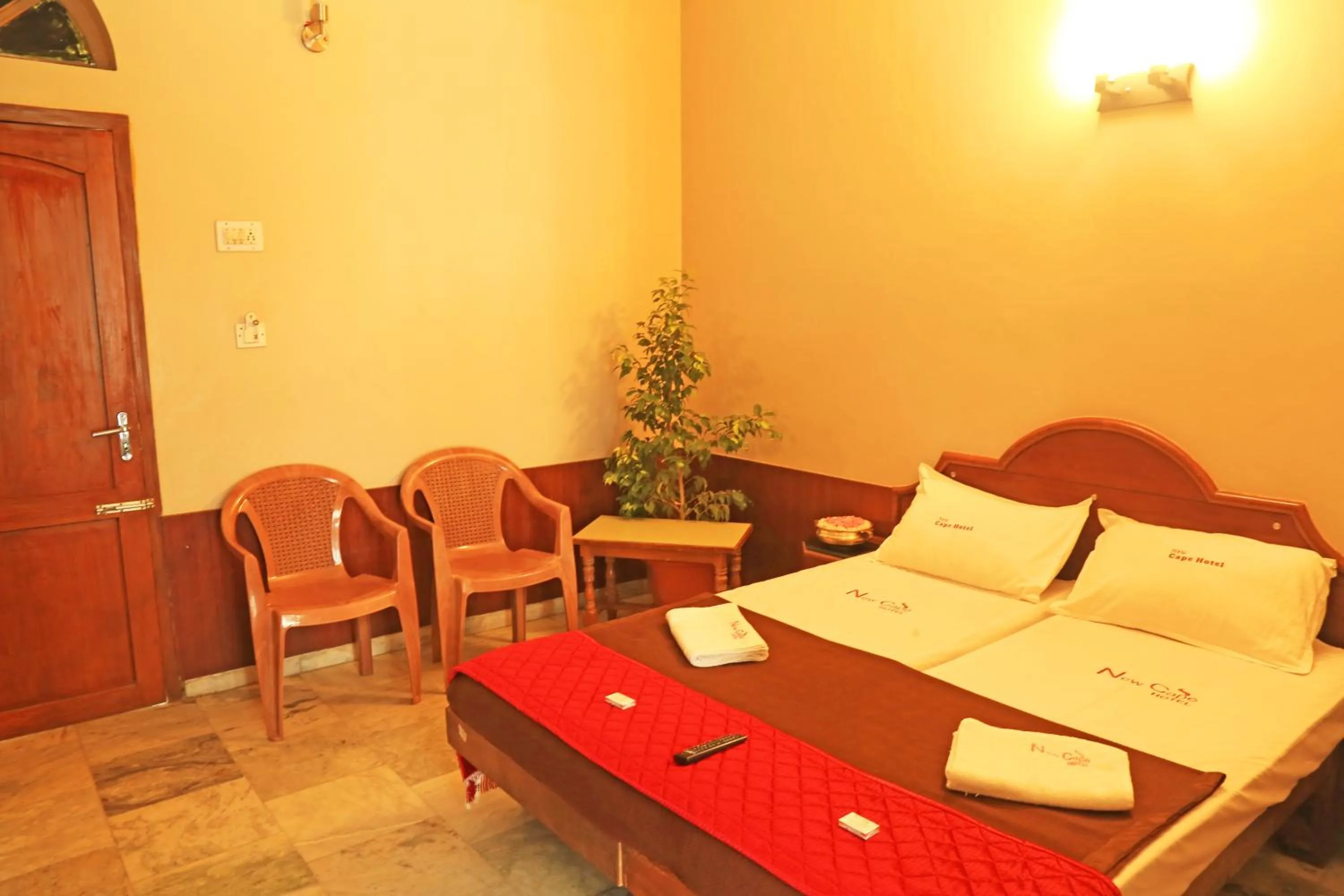 Bed in New Cape Hotel