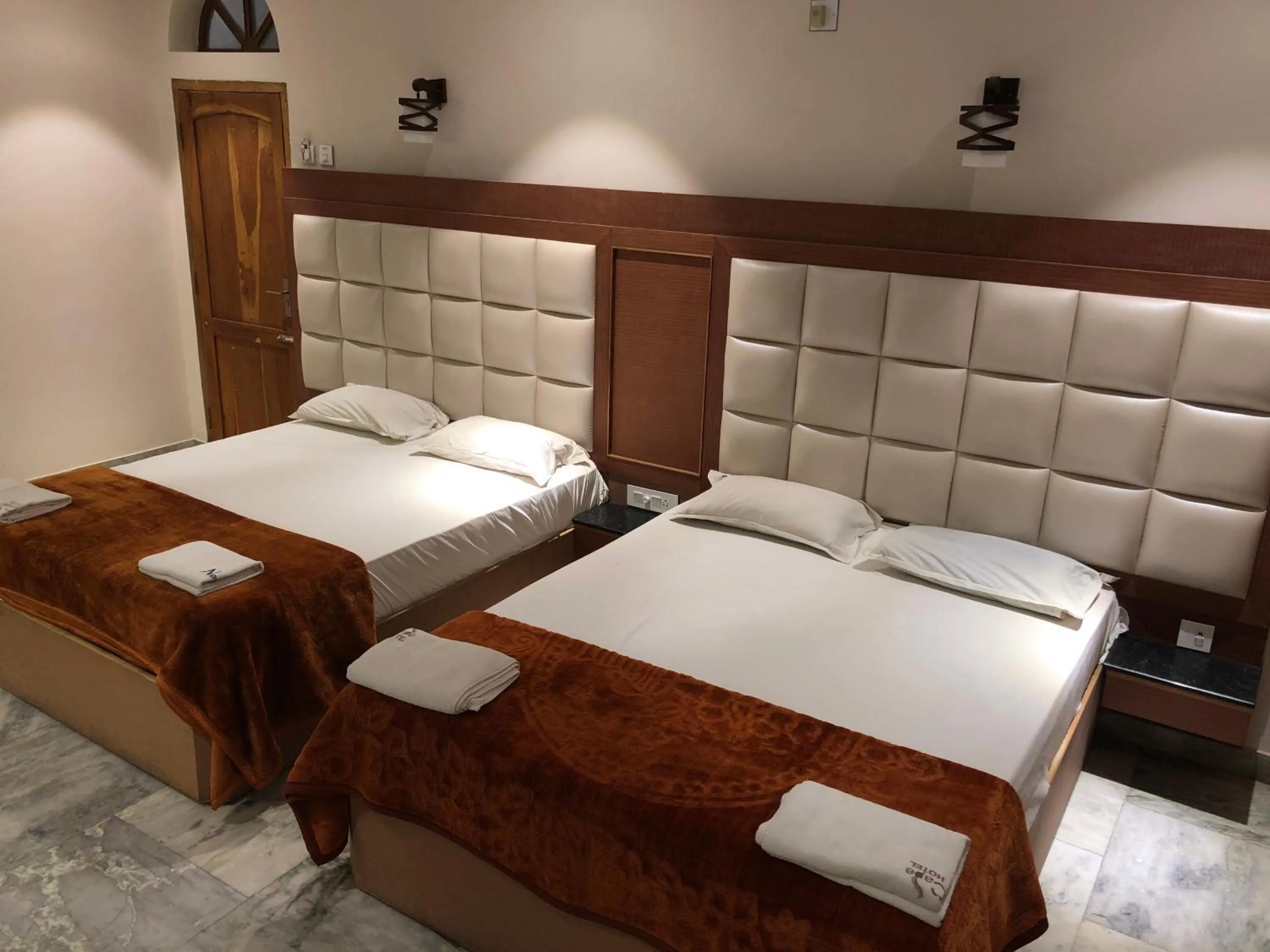 Bed in New Cape Hotel