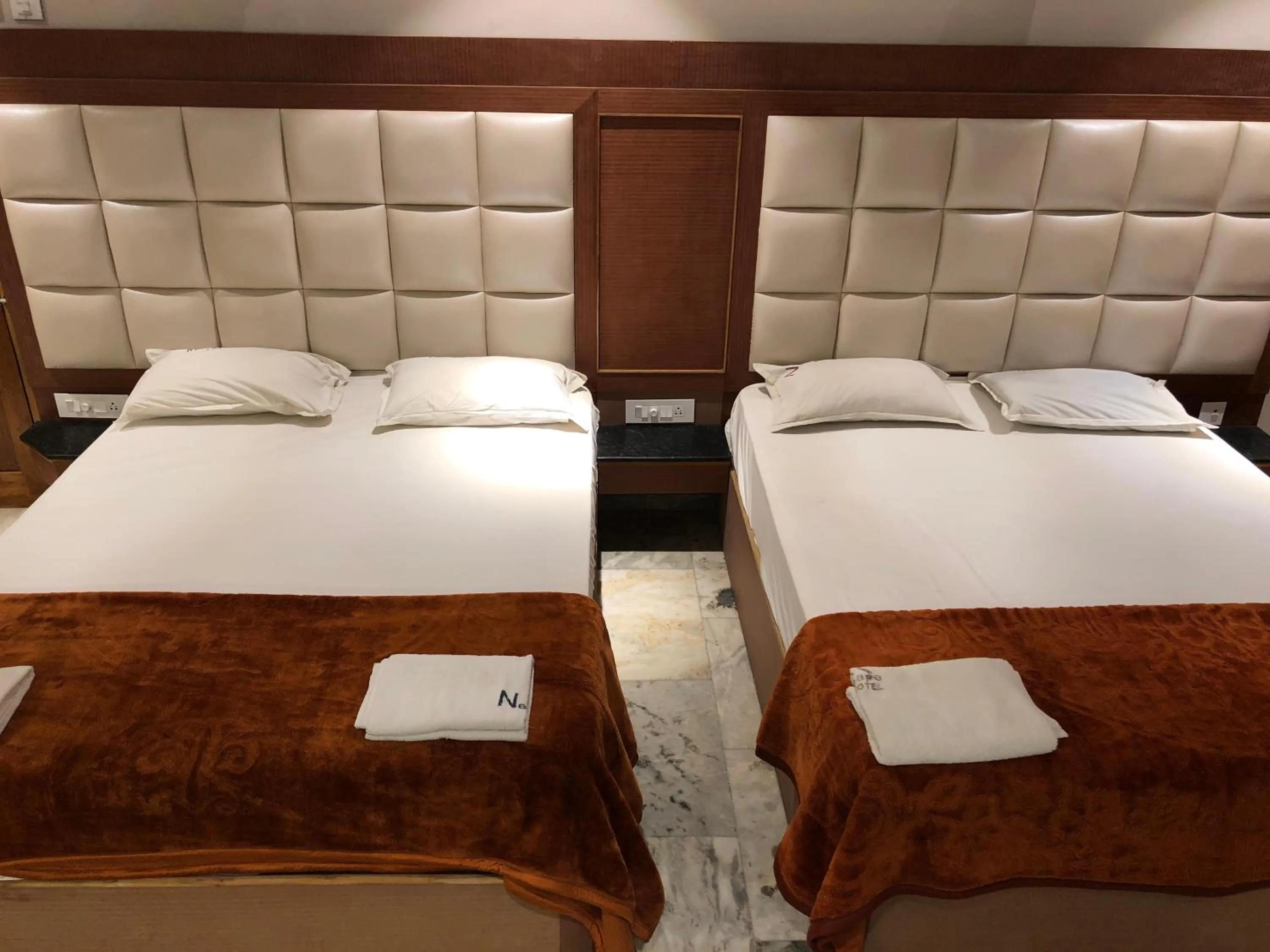 Bed in New Cape Hotel