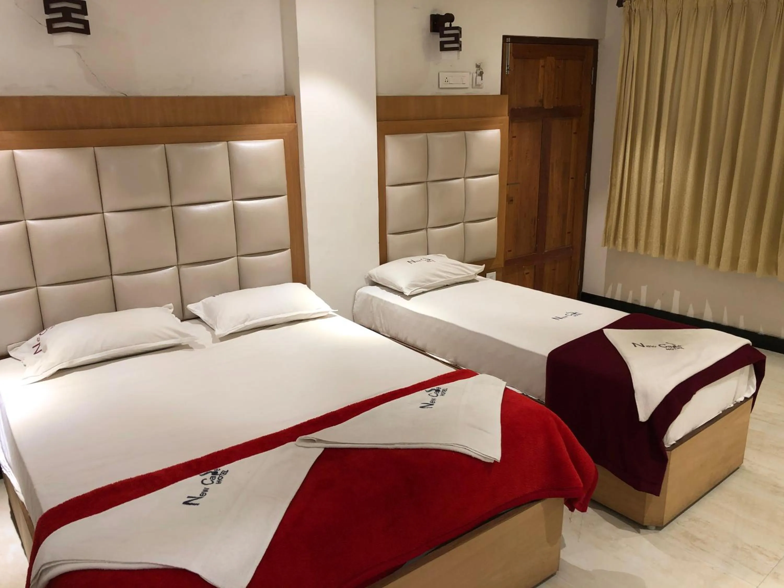 Bed in New Cape Hotel